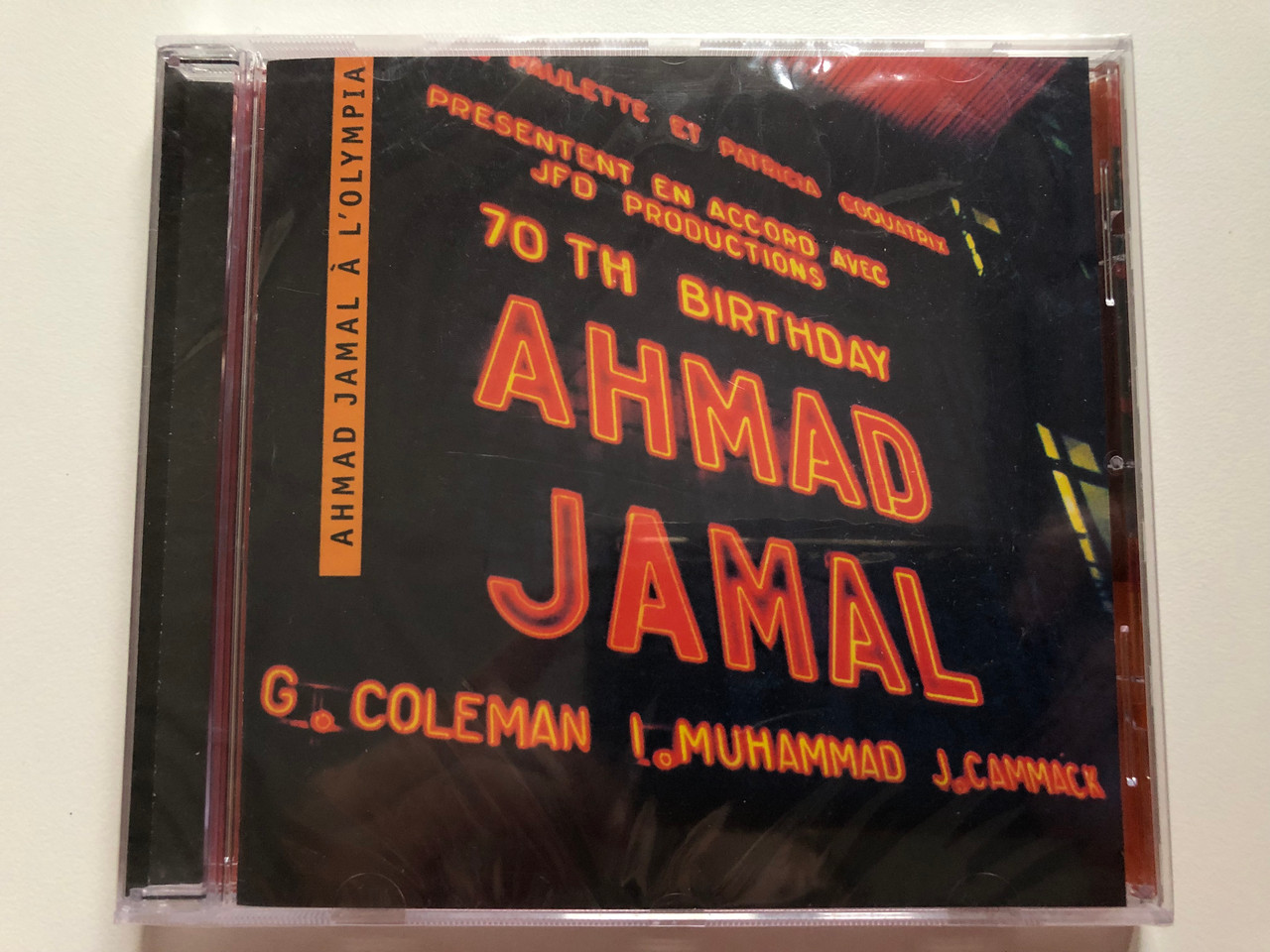 https://cdn10.bigcommerce.com/s-62bdpkt7pb/products/0/images/202380/Ahmad_Jamal_LOlympia_70th_Birthday_Ahmad_Jamal_-_G._Coleman_I._Muhammad_J._Cammack_Dreyfus_Jazz_Audio_CD_2001_FDM_36629-2_1__84315.1640075790.1280.1280.JPG?c=2&_gl=1*1xmif5t*_ga*MjA2NTIxMjE2MC4xNTkwNTEyNTMy*_ga_WS2VZYPC6G*MTY0MDA2ODkyOS4yMjUuMS4xNjQwMDc0NTI0LjU3
