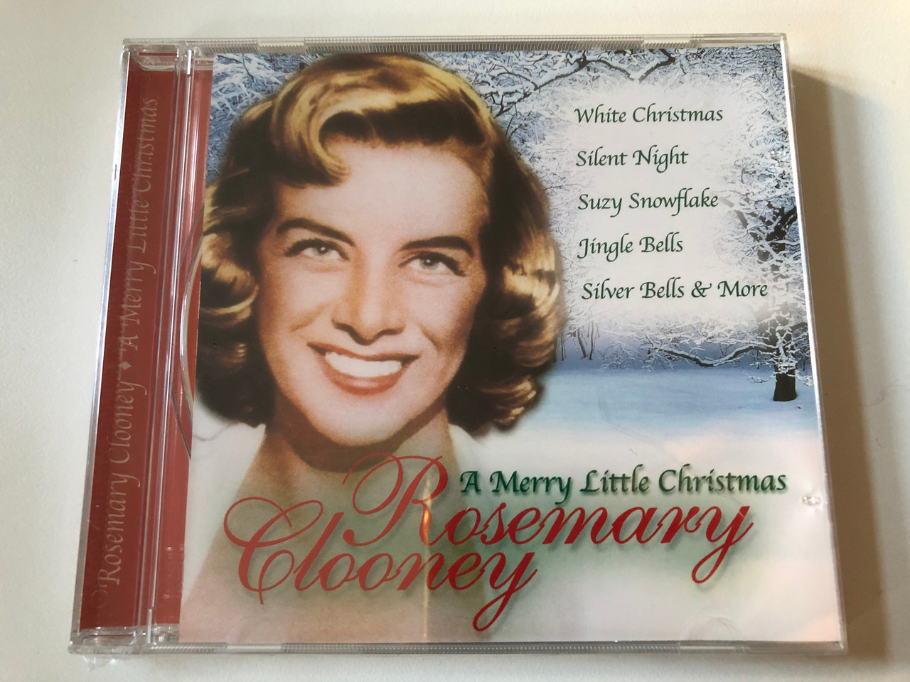 https://cdn10.bigcommerce.com/s-62bdpkt7pb/products/0/images/202808/A_Merry_Little_Christmas_-_Rosemary_Clooney_Legacy_Audio_CD_TVS023_1__44359.1640256121.1280.1280.JPG?c=2&_gl=1*1dpvdky*_ga*MjA2NTIxMjE2MC4xNTkwNTEyNTMy*_ga_WS2VZYPC6G*MTY0MDI1MDU3NC4yMjkuMS4xNjQwMjU2MDY2LjYw