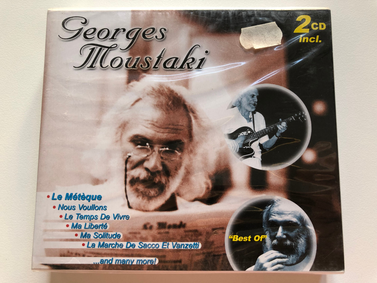 https://cdn10.bigcommerce.com/s-62bdpkt7pb/products/0/images/202983/Georges_Moustaki_-_Le_Meteque_Nous_Voullons_Le_Temps_De_Vivre_Ma_Liberte_Ma_Solitude_La_Marche_De_Sacco_Et_Vanzetti_and_many_more_Best_Of_Berger_Music_2x_Audio_CD_1999_5775_1__87453.1640368294.1280.1280.JPG?c=2&_gl=1*8qdm8a*_ga*MjA2NTIxMjE2MC4xNTkwNTEyNTMy*_ga_WS2VZYPC6G*MTY0MDM2MjE0NS4yMzUuMS4xNjQwMzY3NjI3LjM2