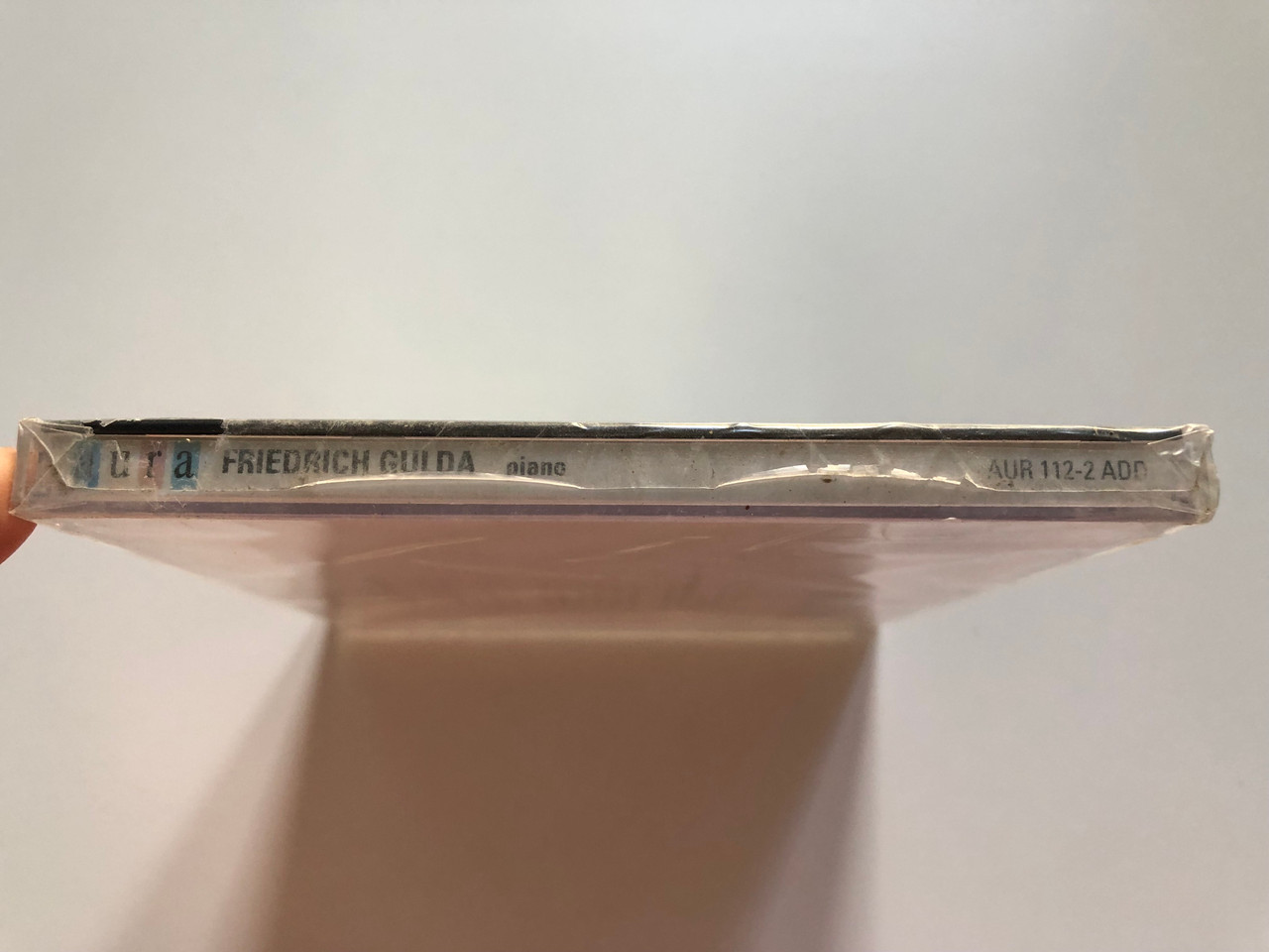 https://cdn10.bigcommerce.com/s-62bdpkt7pb/products/0/images/202987/Friedrich_Gulda_Piano_-_Haydn_Mozart_Beethoven_Schubert_Aura_Music_Audio_CD_1999_AUR_112_2_3__47712.1640369600.1280.1280.JPG?c=2&_gl=1*2r4ke9*_ga*MjA2NTIxMjE2MC4xNTkwNTEyNTMy*_ga_WS2VZYPC6G*MTY0MDM2MjE0NS4yMzUuMS4xNjQwMzY5NTc5LjYw
