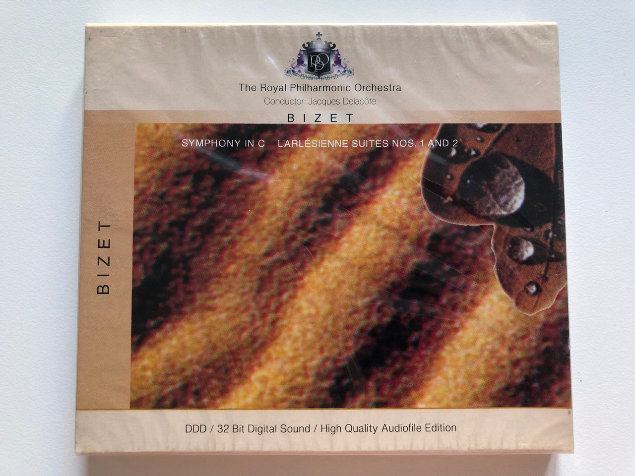 https://cdn10.bigcommerce.com/s-62bdpkt7pb/products/0/images/203190/Bizet_-_Symphony_In_C_LArlsienne_Suites_Nos._1_And_2_The_Royal_Philharmonic_Orchestra_Conductor_Jacques_Delacte_RPO_Records_Audio_CD_2000_204449-201_1__12437.1640621807.1280.1280.JPG?c=2&_gl=1*1bcgepk*_ga*MjA2NTIxMjE2MC4xNTkwNTEyNTMy*_ga_WS2VZYPC6G*MTY0MDYxNjQyNS4yMzYuMS4xNjQwNjIxNjYxLjU4