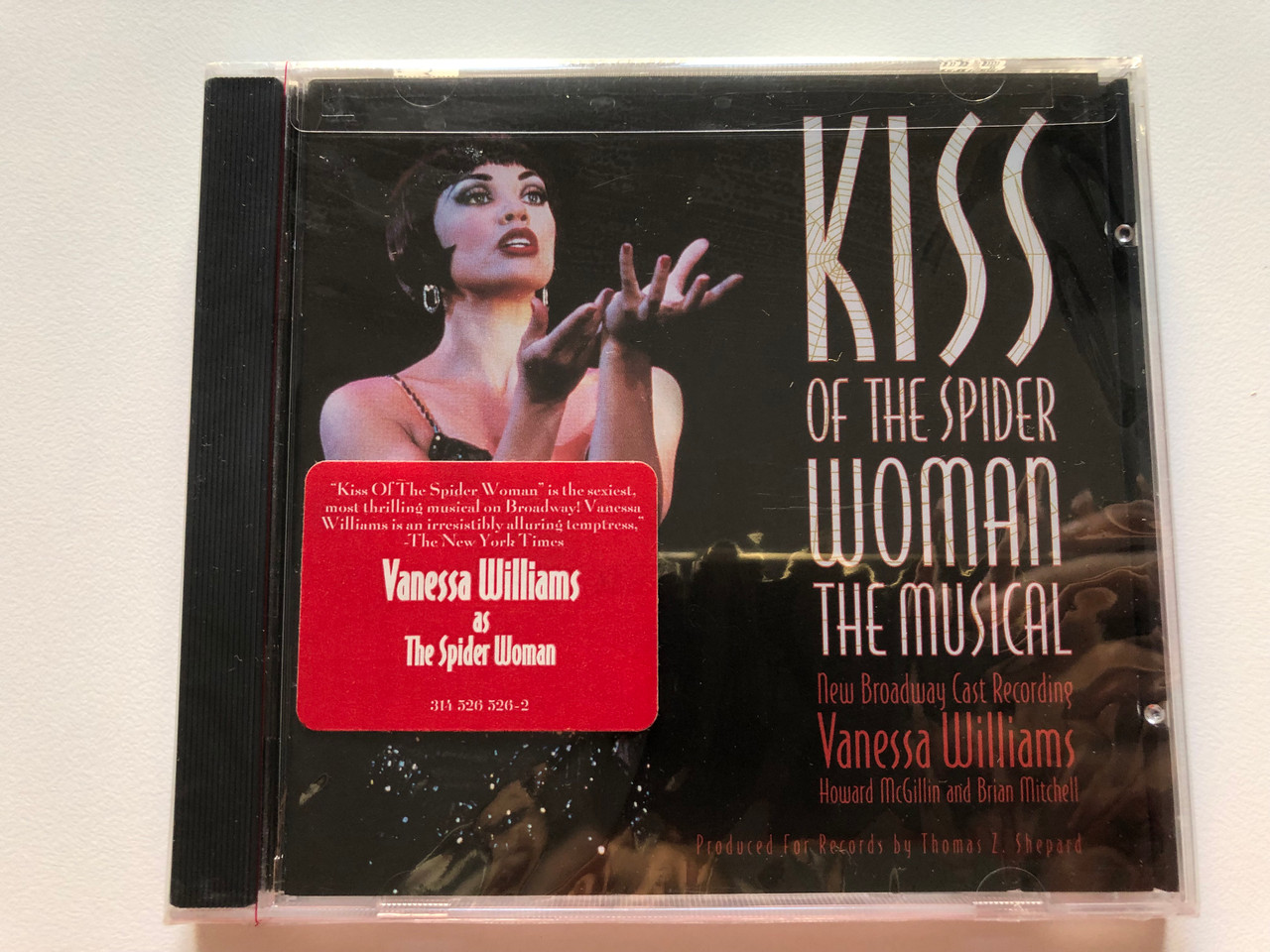 https://cdn10.bigcommerce.com/s-62bdpkt7pb/products/0/images/203241/Kiss_Of_The_Spider_Woman_The_Musical_-_New_Broadway_Cast_Recording_Venessa_Williams_Howard_McGillin_and_Brian_Mitchell_Produced_For_Records_by_Thomas_Z._Shepard_Mercury_Audio_CD_1995_314_1__94886.1640702812.1280.1280.JPG?c=2&_gl=1*6mo518*_ga*MjA2NTIxMjE2MC4xNTkwNTEyNTMy*_ga_WS2VZYPC6G*MTY0MDcwMjMxMS4yMzcuMS4xNjQwNzAyNjExLjQy