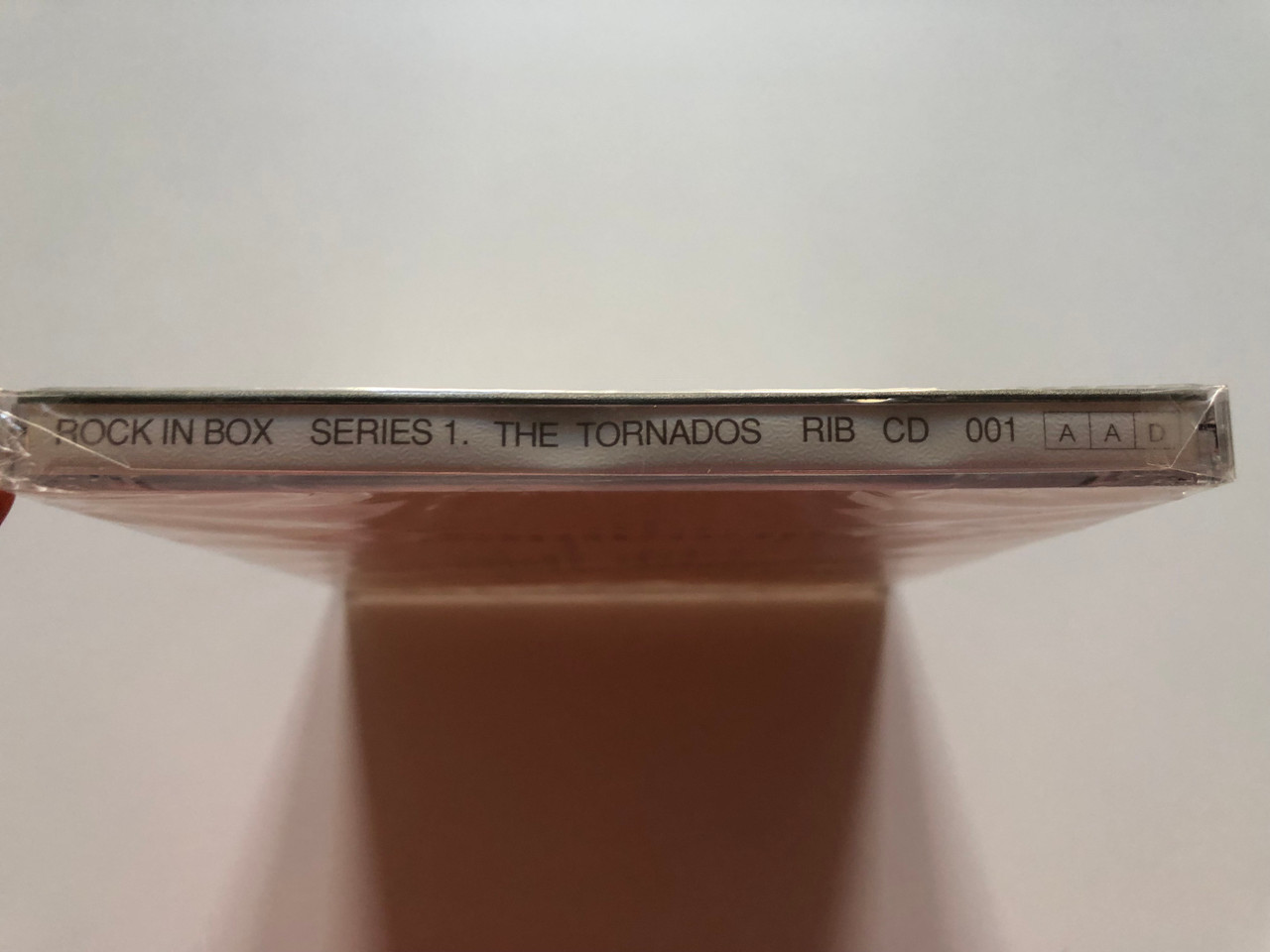 https://cdn10.bigcommerce.com/s-62bdpkt7pb/products/0/images/203252/The_Tornados_Rock_In_Box_Series_1._Rock_In_Box_Audio_CD_RIB_CD_001_3__25287.1640704442.1280.1280.JPG?c=2&_gl=1*13zsv9h*_ga*MjA2NTIxMjE2MC4xNTkwNTEyNTMy*_ga_WS2VZYPC6G*MTY0MDcwMjMxMS4yMzcuMS4xNjQwNzA0MzYwLjU4