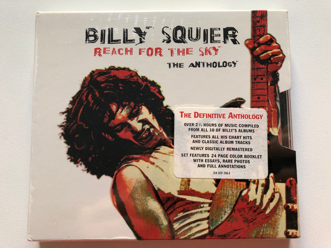 https://cdn10.bigcommerce.com/s-62bdpkt7pb/products/0/images/203301/Billy_Squier_Reach_For_The_Sky_The_Anthology_Over_2_12_Hours_Of_Music_Compiled_From_All_10_Of_Billys_Albums_Features_All_His_Chart_Hits_And_Classic_Album_Tracks._Newly_Digitally_Remaster_1__49686.1640712731.1280.1280.JPG?c=2&_gl=1*p571m1*_ga*MjA2NTIxMjE2MC4xNTkwNTEyNTMy*_ga_WS2VZYPC6G*MTY0MDcwMjMxMS4yMzcuMS4xNjQwNzEyMzI0LjIz
