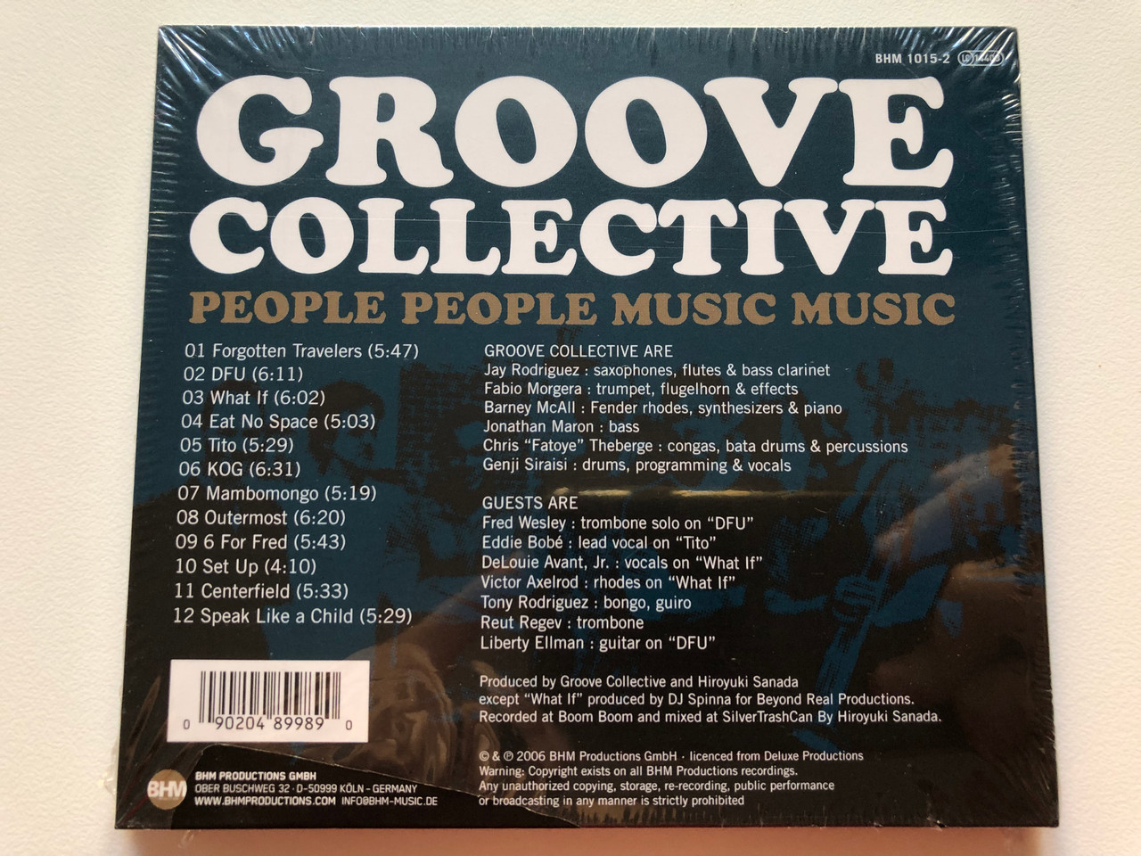 https://cdn10.bigcommerce.com/s-62bdpkt7pb/products/0/images/203354/Groove_Collective_People_People_Music_Music_Incl._Soecial_Guests_Fred_Wesley_Victor_Axelrod_Eddie_Bob_and_many_more_BHM_Productions_Audio_CD_2006_BHM_1015-2_2__75595.1640784667.1280.1280.JPG?c=2&_gl=1*gvzibf*_ga*MjA2NTIxMjE2MC4xNTkwNTEyNTMy*_ga_WS2VZYPC6G*MTY0MDc4NDQ2Mi4yMzguMC4xNjQwNzg0NDYyLjYw