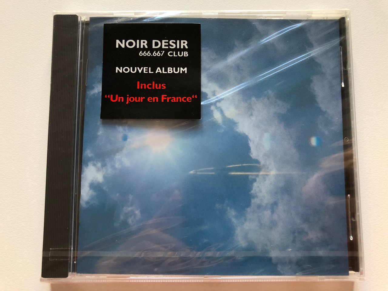 https://cdn10.bigcommerce.com/s-62bdpkt7pb/products/0/images/203360/Noir_Dsir_666.667_Club_Nouvel_Album_Inclus_Un_Jour_En_France_Barclay_Audio_CD_1996_533442-2_1__58297.1640785370.1280.1280.JPG?c=2&_gl=1*m4pmav*_ga*MjA2NTIxMjE2MC4xNTkwNTEyNTMy*_ga_WS2VZYPC6G*MTY0MDc4NDQ2Mi4yMzguMS4xNjQwNzg1MTk3LjU4