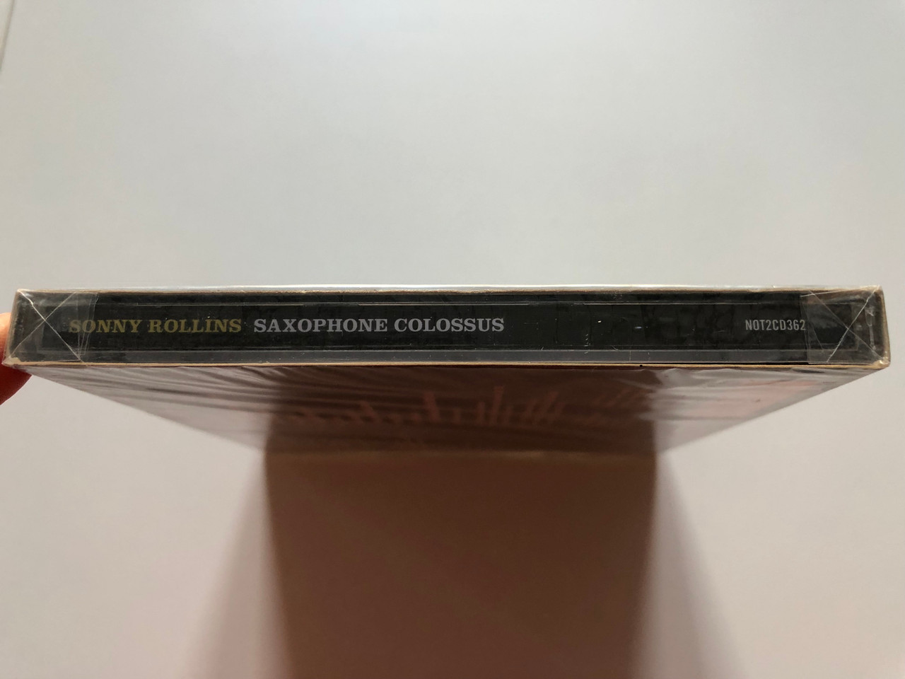 https://cdn10.bigcommerce.com/s-62bdpkt7pb/products/0/images/203368/Sonny_Rollins_Saxophone_Colossus_The_Iconic_Jazz_Masterpiece_Two_Bonus_Albums_Digitally_Remastered_On_2CDs_Not_Now_Music_2x_Audio_CD_2010_NOT2CD362_3__64616.1640787347.1280.1280.JPG?c=2&_gl=1*gsmo7l*_ga*MjA2NTIxMjE2MC4xNTkwNTEyNTMy*_ga_WS2VZYPC6G*MTY0MDc4NDQ2Mi4yMzguMS4xNjQwNzg3MzQxLjYw