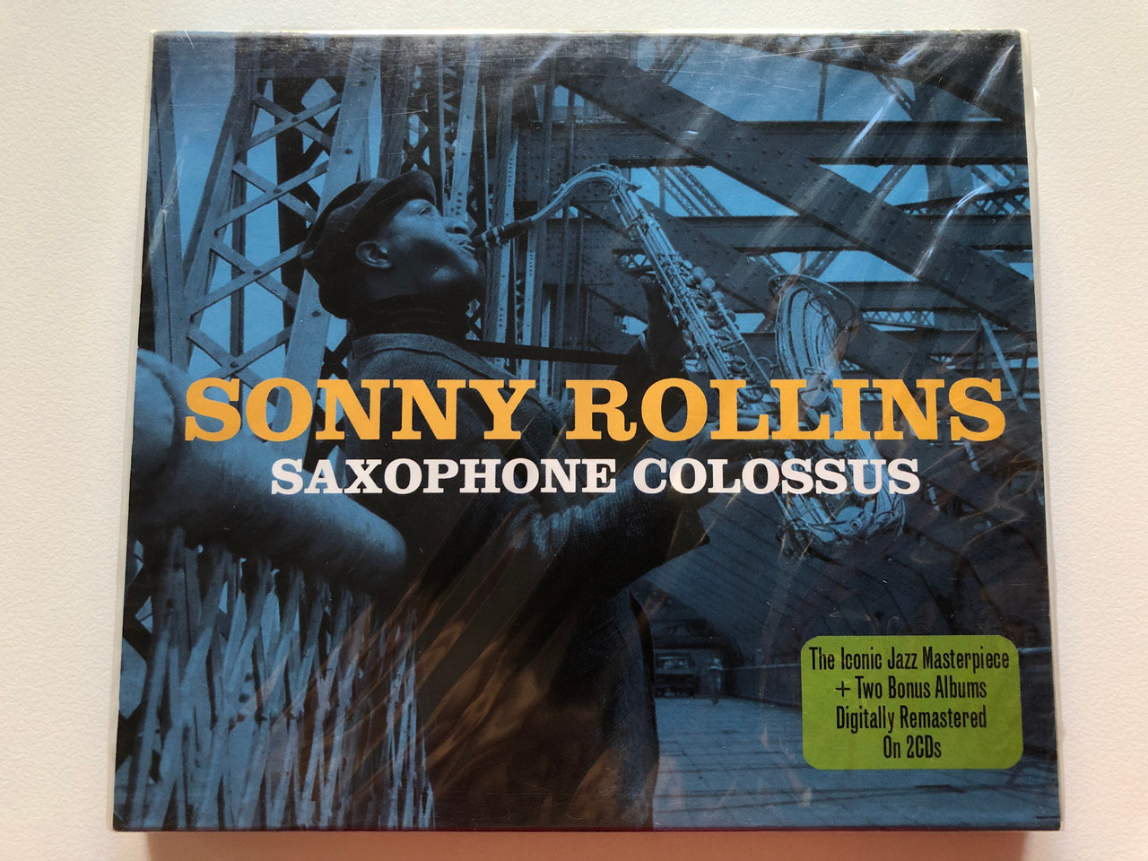 https://cdn10.bigcommerce.com/s-62bdpkt7pb/products/0/images/203370/Sonny_Rollins_Saxophone_Colossus_The_Iconic_Jazz_Masterpiece_Two_Bonus_Albums_Digitally_Remastered_On_2CDs_Not_Now_Music_2x_Audio_CD_2010_NOT2CD362_1__05307.1640787349.1280.1280.JPG?c=2&_gl=1*gsmo7l*_ga*MjA2NTIxMjE2MC4xNTkwNTEyNTMy*_ga_WS2VZYPC6G*MTY0MDc4NDQ2Mi4yMzguMS4xNjQwNzg3MzQxLjYw