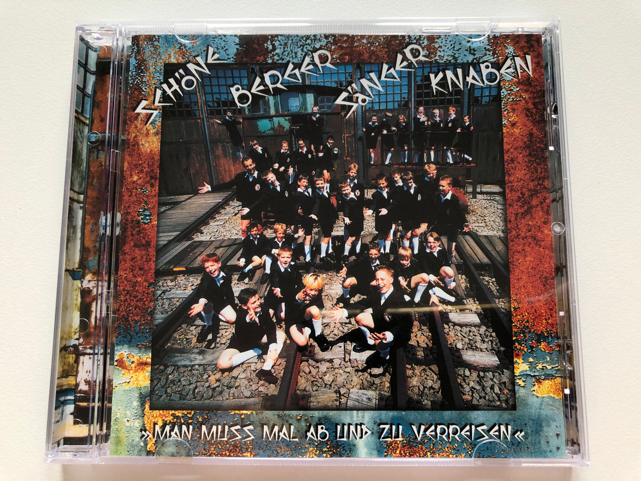 https://cdn10.bigcommerce.com/s-62bdpkt7pb/products/0/images/203480/Schoneberger_Sangerknaben_-_Man_muss_mal_ab_und_zu_verrseisen_Monopol_Records_Audio_CD_2002_MON938263_1__72511.1640798332.1280.1280.JPG?c=2&_gl=1*ewnwfs*_ga*MjA2NTIxMjE2MC4xNTkwNTEyNTMy*_ga_WS2VZYPC6G*MTY0MDc4NDQ2Mi4yMzguMS4xNjQwNzk4MDg4LjU4