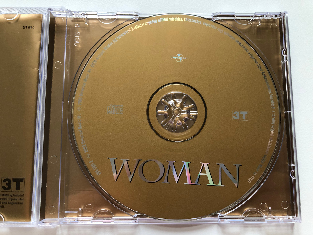 https://cdn10.bigcommerce.com/s-62bdpkt7pb/products/0/images/203626/Woman_Universal_Music_Audio_CD_2002_584_980-2_3__45515.1640870613.1280.1280.JPG?c=2&_gl=1*3d2vpe*_ga*MjA2NTIxMjE2MC4xNTkwNTEyNTMy*_ga_WS2VZYPC6G*MTY0MDg2NzM3NS4yMzkuMS4xNjQwODcwNTI5LjQy
