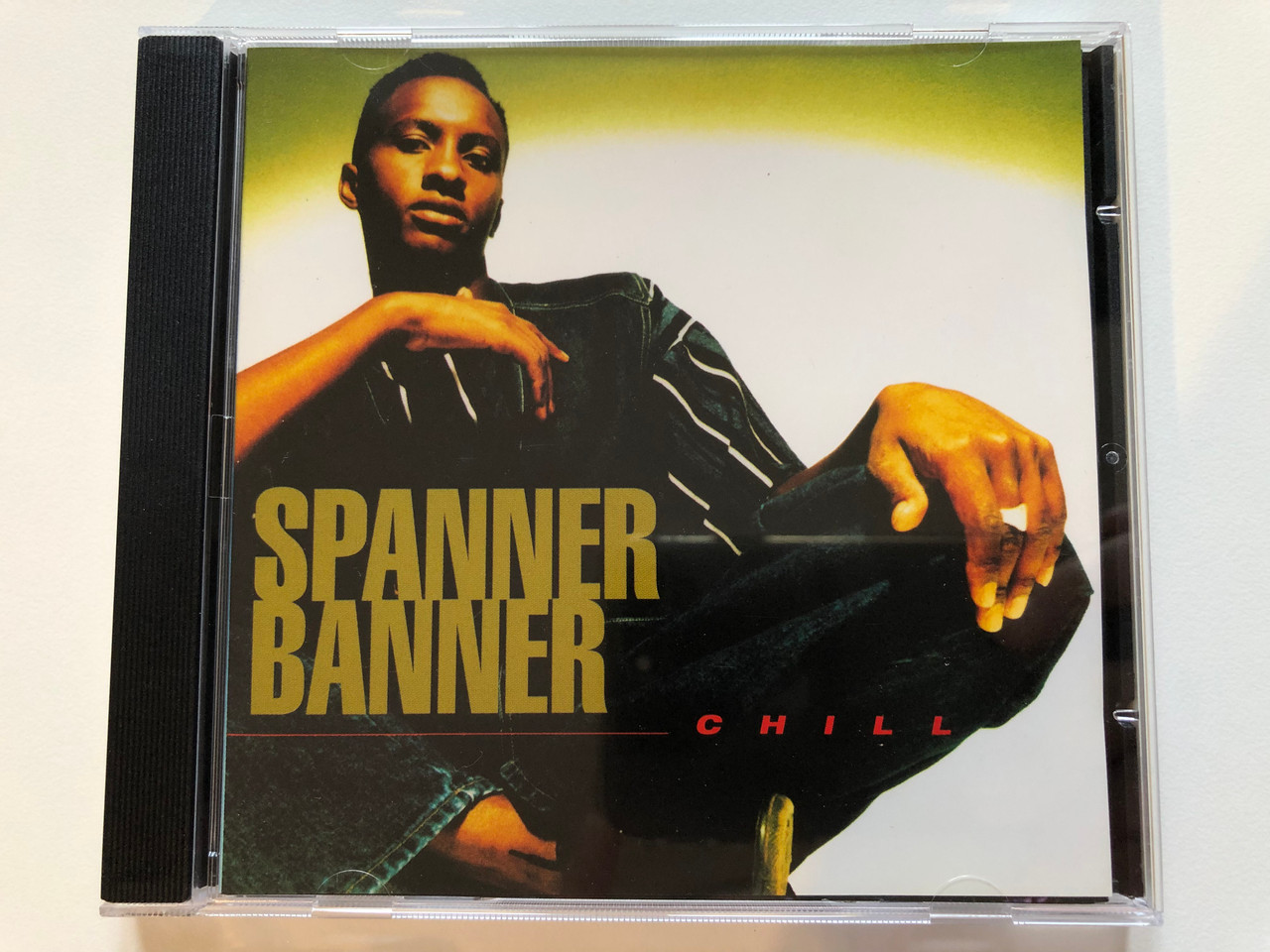 https://cdn10.bigcommerce.com/s-62bdpkt7pb/products/0/images/203788/Spanner_Banner_Chill_Island_Jamaica_Audio_CD_1995_IJCD_3006_1__85641.1640964895.1280.1280.JPG?c=2&_gl=1*4l2qvk*_ga*MjA2NTIxMjE2MC4xNTkwNTEyNTMy*_ga_WS2VZYPC6G*MTY0MDk2MTcwMy4yNDEuMS4xNjQwOTY0ODkwLjYw