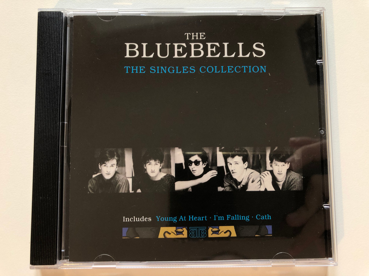 https://cdn10.bigcommerce.com/s-62bdpkt7pb/products/0/images/203793/The_Bluebells_The_Singles_Collection_Includes_Young_At_Heart_Im_Falling_Cath_London_Records_Audio_CD_1993_828_405-2_1__74011.1640967494.1280.1280.JPG?c=2&_gl=1*y8mfa7*_ga*MjA2NTIxMjE2MC4xNTkwNTEyNTMy*_ga_WS2VZYPC6G*MTY0MDk2MTcwMy4yNDEuMS4xNjQwOTY1MzY1LjU4