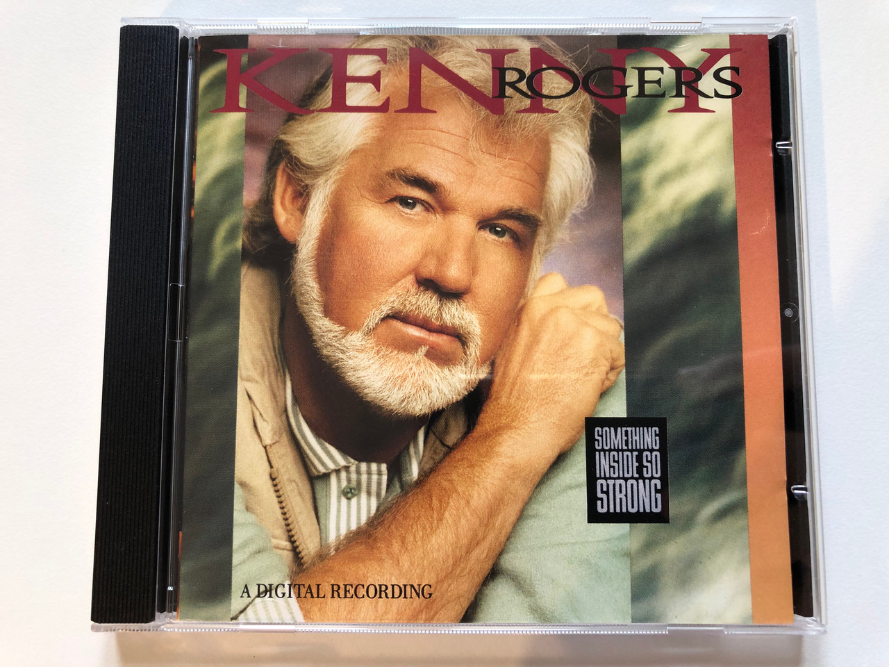 https://cdn10.bigcommerce.com/s-62bdpkt7pb/products/0/images/203808/Kenny_Rogers_Something_Inside_So_Strong_Gong_Audio_CD_1989_HCDL_37305_1__00954.1640971317.1280.1280.JPG?c=2&_gl=1*zzhour*_ga*MjA2NTIxMjE2MC4xNTkwNTEyNTMy*_ga_WS2VZYPC6G*MTY0MDk3MDQ3NC4yNDMuMS4xNjQwOTcxMjQ0LjYw