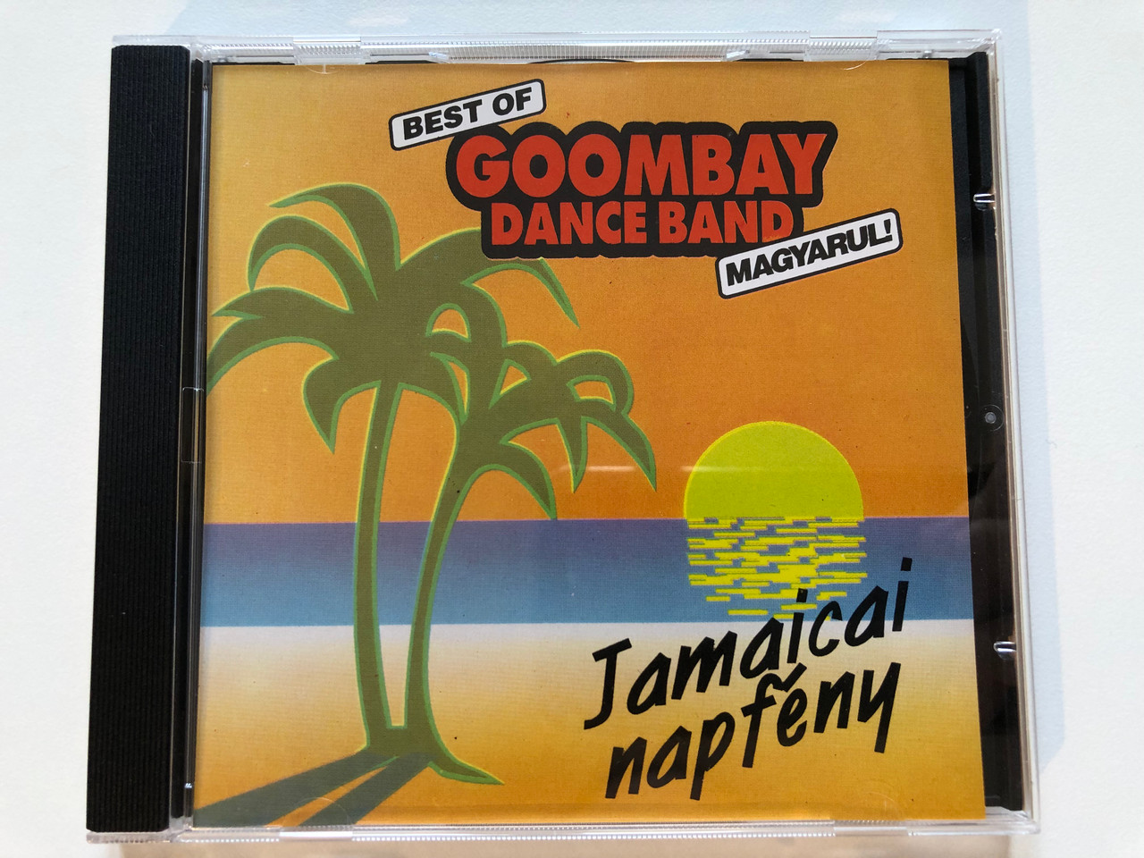 https://cdn10.bigcommerce.com/s-62bdpkt7pb/products/0/images/203828/Best_Of_Goombay_Dance_Band_Magyarul_-_Jamaicai_Napfny_Microprofit_Kiad_Audio_CD_1993_MPCD_004_1__64822.1640973458.1280.1280.JPG?c=2&_gl=1*u7ve5t*_ga*MjA2NTIxMjE2MC4xNTkwNTEyNTMy*_ga_WS2VZYPC6G*MTY0MDk3MDQ3NC4yNDMuMS4xNjQwOTczMjMzLjMz