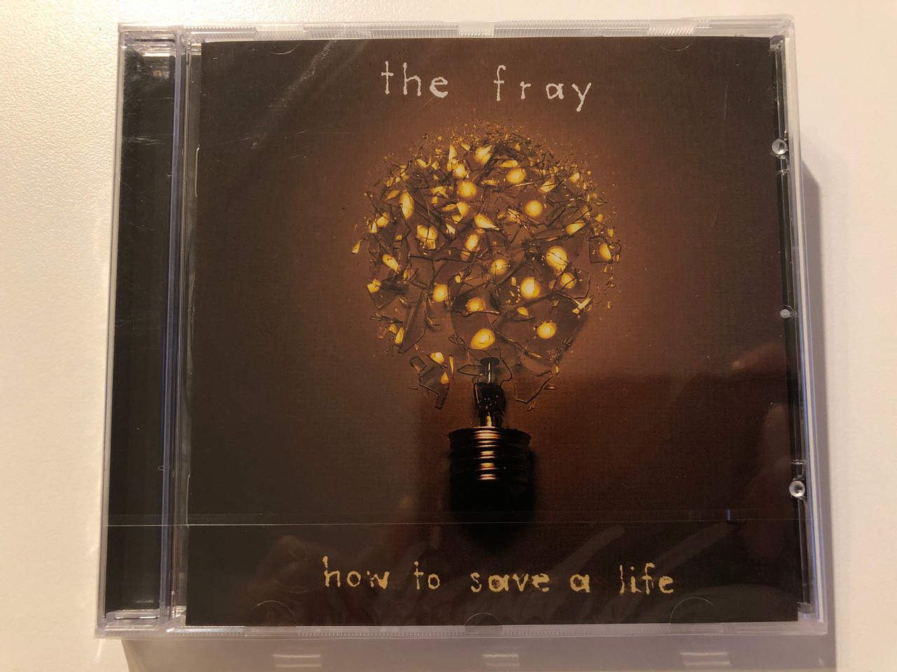 https://cdn10.bigcommerce.com/s-62bdpkt7pb/products/0/images/204876/The_Fray_How_To_Save_A_Life_Epic_Audio_CD_2005_82876861432_1__86445.1641534528.1280.1280.JPG?c=2&_gl=1*wsivjp*_ga*MjA2NTIxMjE2MC4xNTkwNTEyNTMy*_ga_WS2VZYPC6G*MTY0MTUzNDM0OS4yNTEuMS4xNjQxNTM0NDM5LjUy