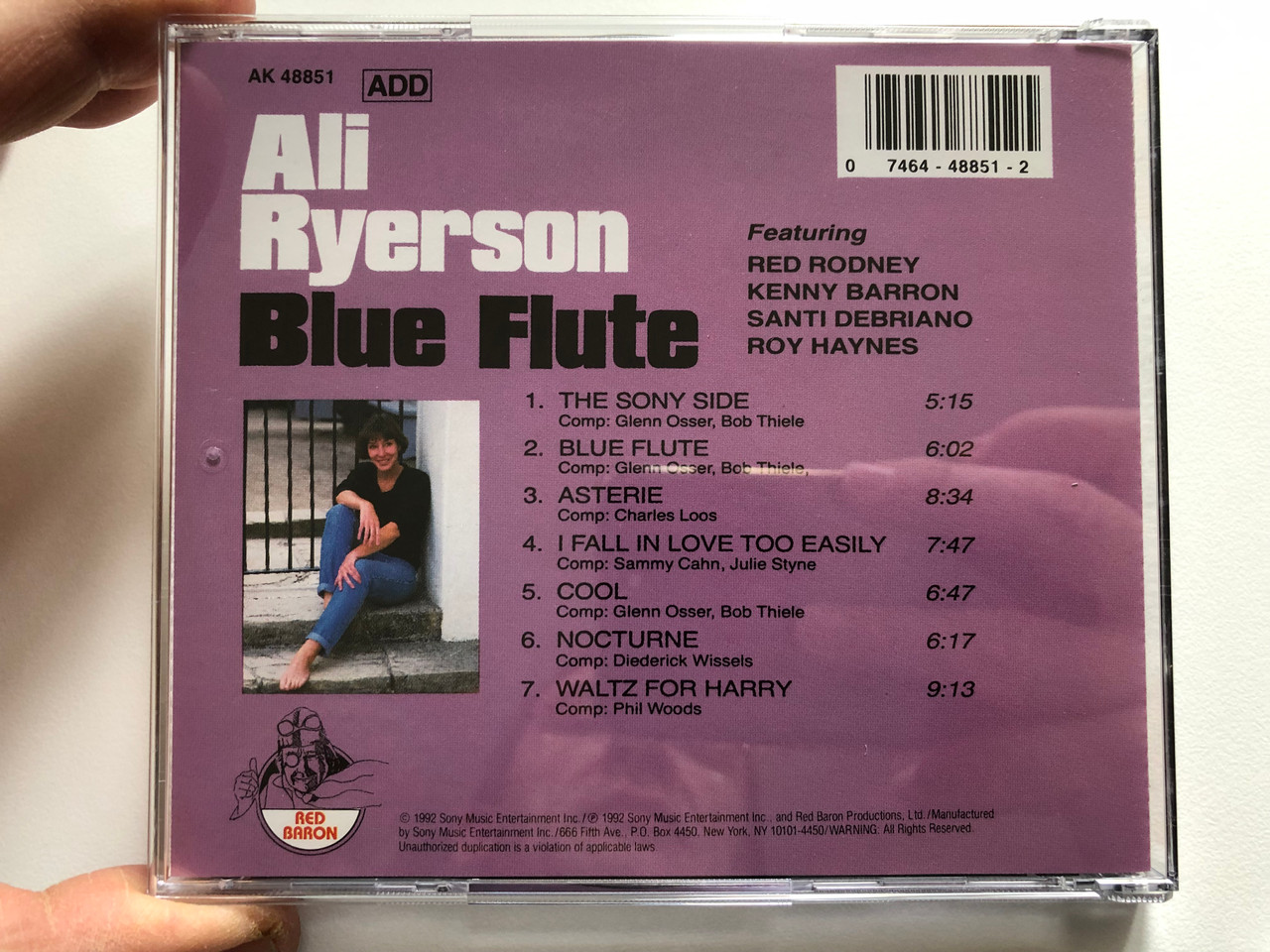 https://cdn10.bigcommerce.com/s-62bdpkt7pb/products/0/images/204903/Ali_Ryerson_Blue_Flute_Featuring_Red_Rodney_Kenny_Barron_Santi_Debriano_Roy_Haynes_Red_Baron_Audio_CD_1992_AK_48851_4__02188.1641537513.1280.1280.JPG?c=2&_gl=1*1emdps2*_ga*MjA2NTIxMjE2MC4xNTkwNTEyNTMy*_ga_WS2VZYPC6G*MTY0MTUzNDM0OS4yNTEuMS4xNjQxNTM3Mzg0LjU3