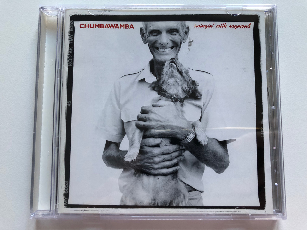 https://cdn10.bigcommerce.com/s-62bdpkt7pb/products/0/images/205871/Chumbawamba_Swingin_With_Raymond_One_Little_Indian_Audio_CD_1995_841246_2_1__12614.1641839090.1280.1280.JPG?c=2&_gl=1*1g6u9cv*_ga*MjA2NTIxMjE2MC4xNTkwNTEyNTMy*_ga_WS2VZYPC6G*MTY0MTgyODg5Mi4yNTMuMS4xNjQxODM4OTkzLjMz