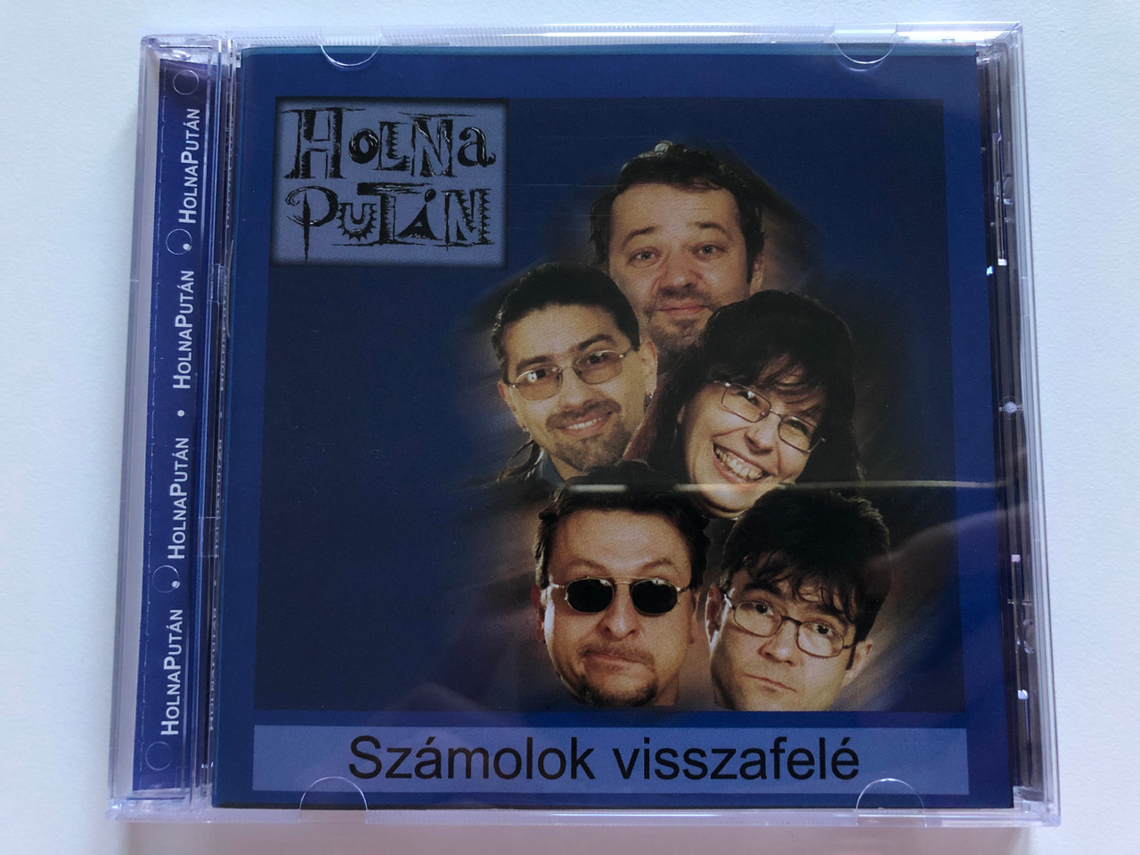 https://cdn10.bigcommerce.com/s-62bdpkt7pb/products/0/images/206053/Holnaputn_Szmolok_Visszafel_Hungaroton_Audio_CD_2002_HCD_71093_1__85803.1641903918.1280.1280.JPG?c=2&_gl=1*1mf86qt*_ga*MjA2NTIxMjE2MC4xNTkwNTEyNTMy*_ga_WS2VZYPC6G*MTY0MTkwMzY3Ni4yNTQuMC4xNjQxOTAzNjc2LjYw