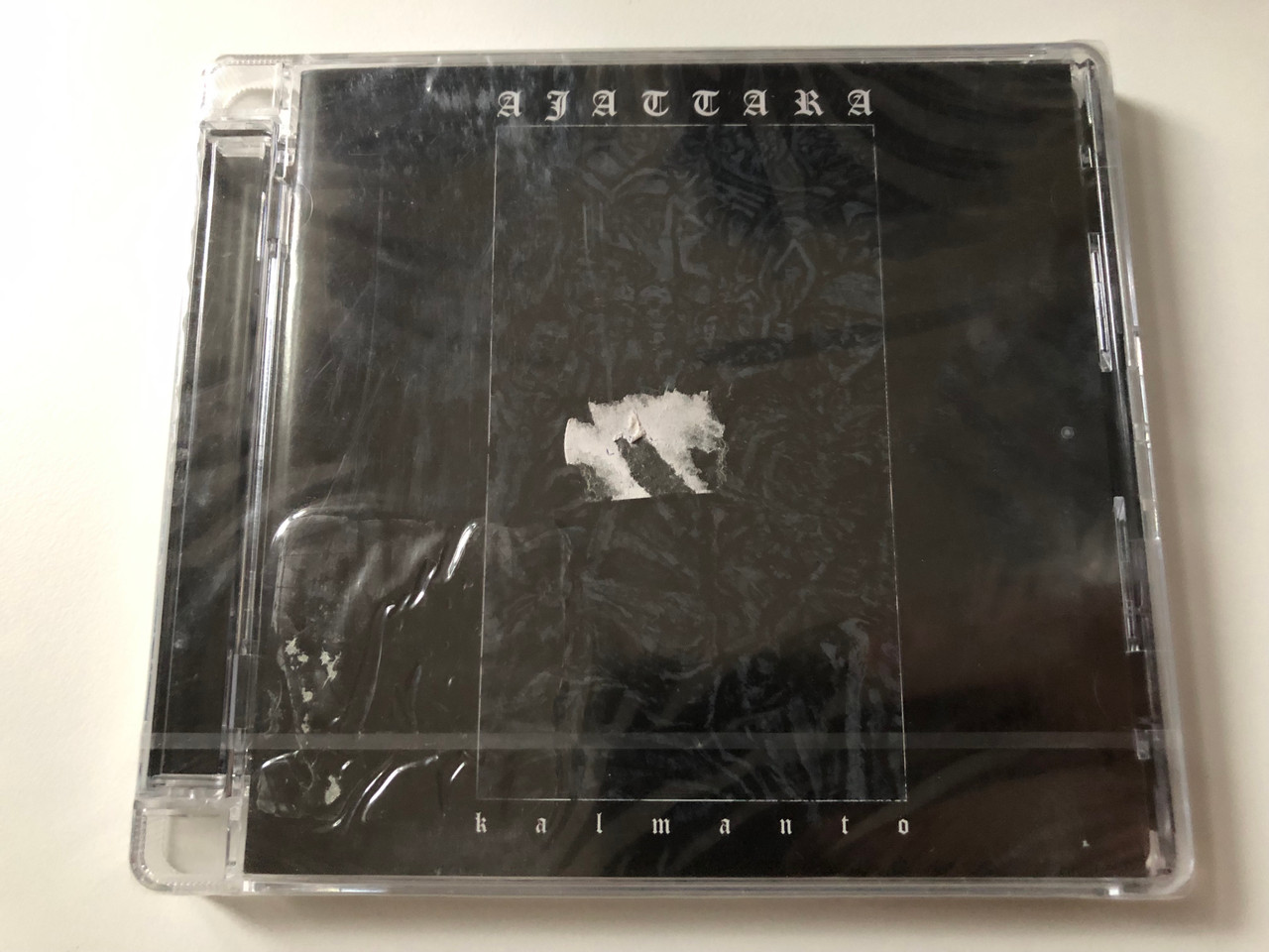 https://cdn10.bigcommerce.com/s-62bdpkt7pb/products/0/images/206146/Ajattara_Kalmanto_Spikefarm_Records_Audio_CD_2007_Naula_096_1__70455.1641917949.1280.1280.JPG?c=2&_gl=1*10nnpm5*_ga*MjA2NTIxMjE2MC4xNTkwNTEyNTMy*_ga_WS2VZYPC6G*MTY0MTkxNzEzOS4yNTUuMS4xNjQxOTE3ODE2LjU3