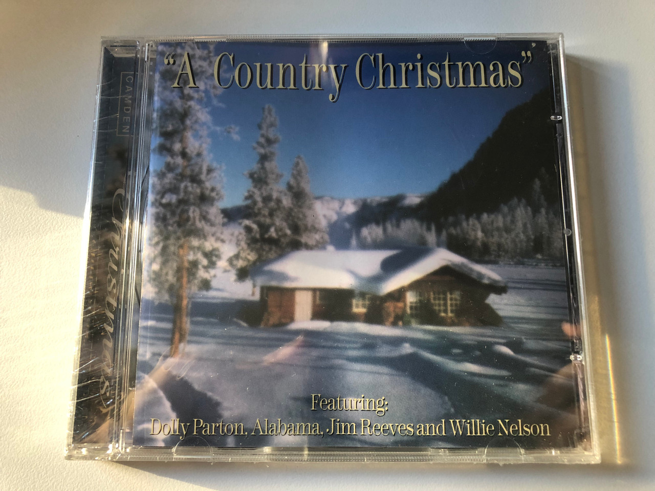 https://cdn10.bigcommerce.com/s-62bdpkt7pb/products/0/images/206203/A_Country_Christmas_-_Featuring_Dolly_Parton_Alabama_Jim_Reeves_and_Willie_Nelson_BMG_Audio_CD_1998_74321_607862_1__94203.1641923458.1280.1280.JPG?c=2&_gl=1*hkizjk*_ga*MjA2NTIxMjE2MC4xNTkwNTEyNTMy*_ga_WS2VZYPC6G*MTY0MTkxNzEzOS4yNTUuMS4xNjQxOTIzMzAzLjU1