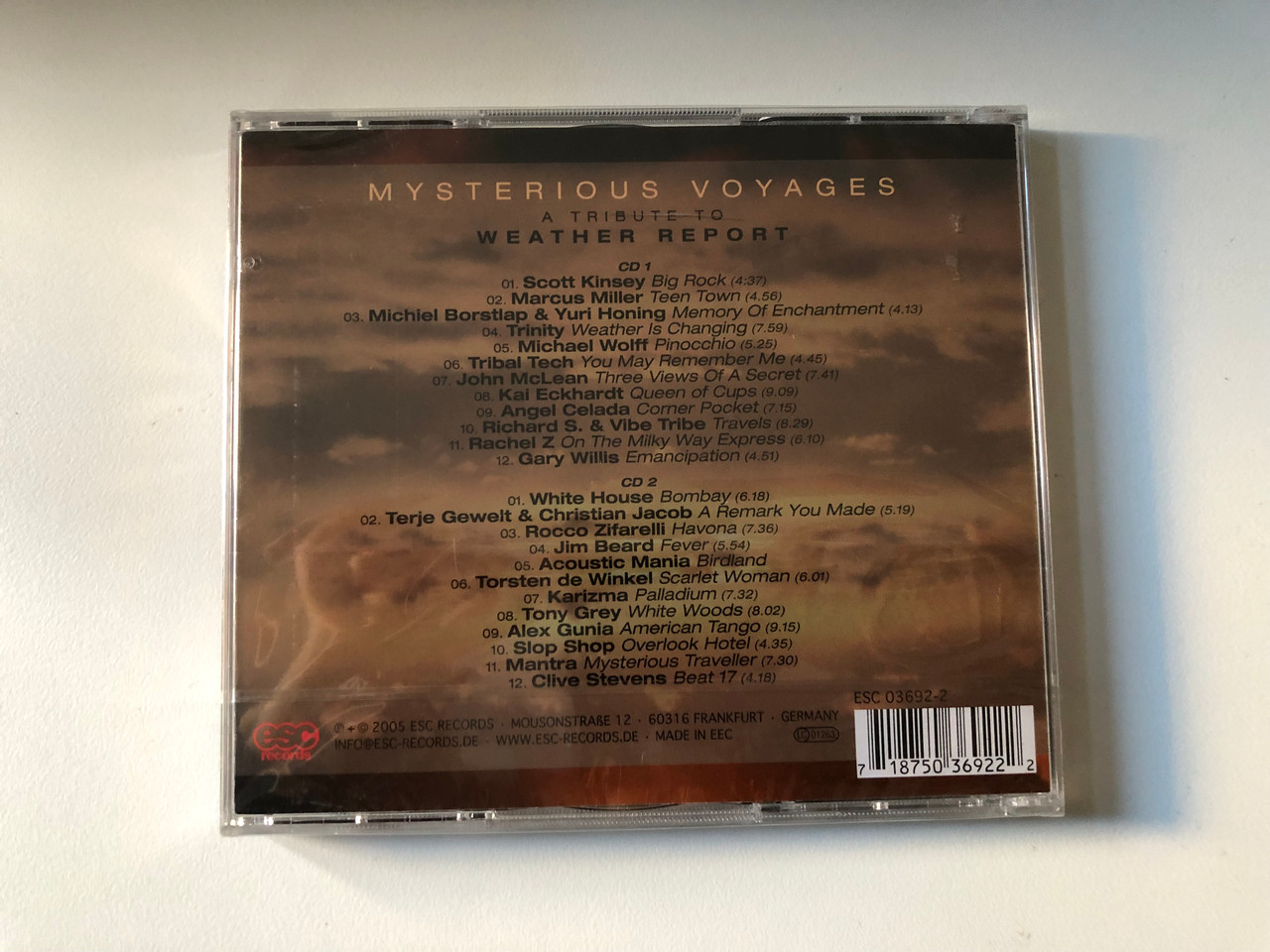 https://cdn10.bigcommerce.com/s-62bdpkt7pb/products/0/images/206422/Mysterious_Voyages_-_A_Tribute_To_Weather_Report_ESC_Records_2x_Audio_CD_2005_ESC_03692-2_2__87160.1642004340.1280.1280.JPG?c=2&_gl=1*1b85lf1*_ga*MjA2NTIxMjE2MC4xNTkwNTEyNTMy*_ga_WS2VZYPC6G*MTY0MTk5OTM4OS4yNTguMS4xNjQyMDA0MjU4LjE0