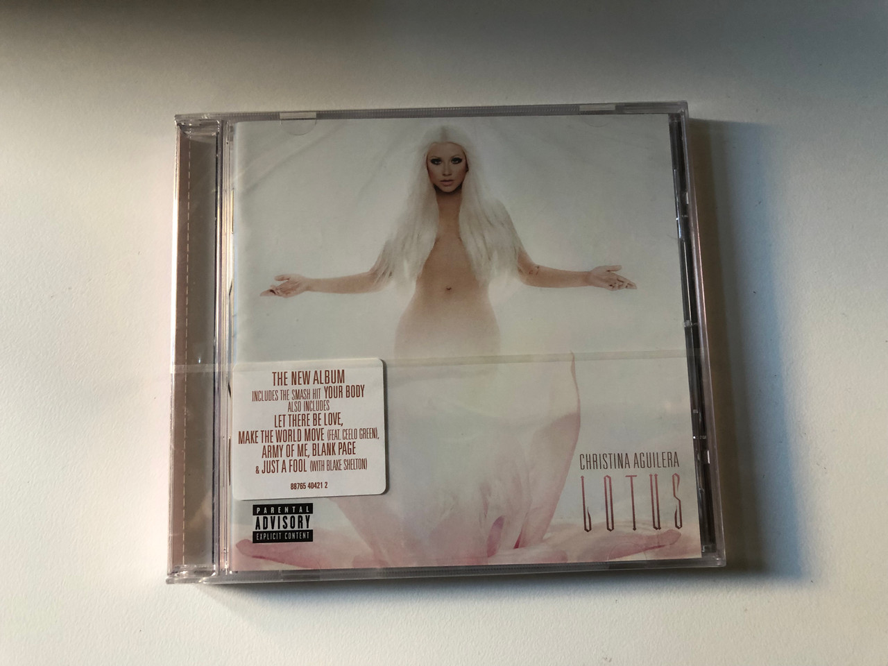 https://cdn10.bigcommerce.com/s-62bdpkt7pb/products/0/images/206424/Christina_Aguilera_Lotus_The_New_Album_Includes_The_Smash_Hit_Your_Body_also_includes_Let_There_Be_Love_Make_The_World_Move_Feat._Ceelo_Green_Army_Of_Me_Blank_Page_Just_1__20061.1642004727.1280.1280.JPG?c=2&_gl=1*1nlv26t*_ga*MjA2NTIxMjE2MC4xNTkwNTEyNTMy*_ga_WS2VZYPC6G*MTY0MTk5OTM4OS4yNTguMS4xNjQyMDA0NTI0LjEw