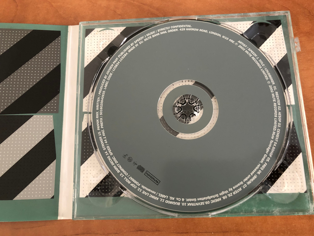 https://cdn10.bigcommerce.com/s-62bdpkt7pb/products/0/images/206634/Speedy_J_Loudboxer_NovaMute_Audio_CD_2002_NOMU93CD_2__57933.1642097126.1280.1280.JPG?c=2&_gl=1*qep7rh*_ga*MjA2NTIxMjE2MC4xNTkwNTEyNTMy*_ga_WS2VZYPC6G*MTY0MjA5NjUxOC4yNjIuMS4xNjQyMDk2OTgxLjM4