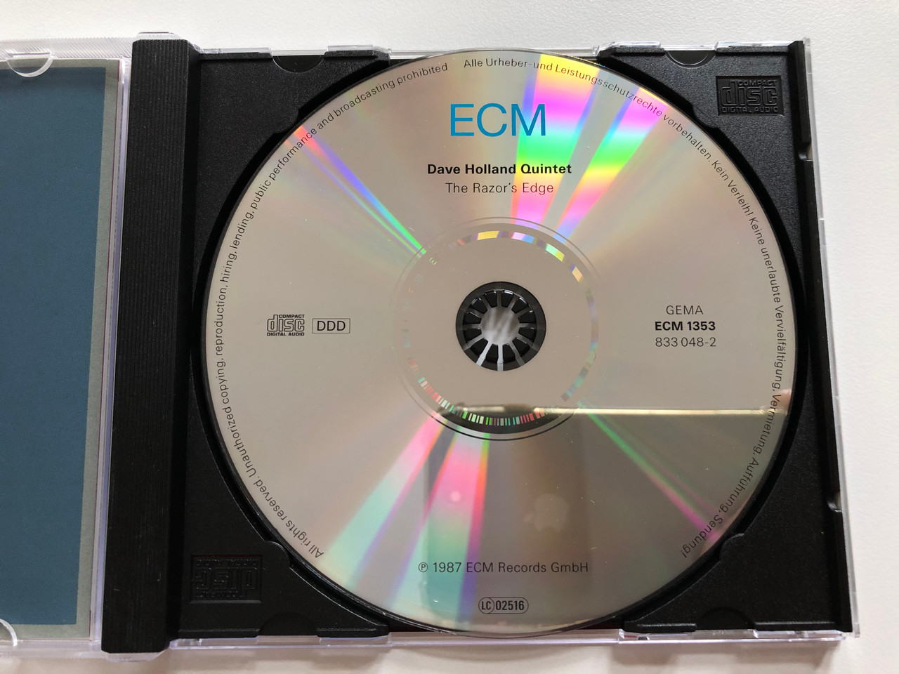 https://cdn10.bigcommerce.com/s-62bdpkt7pb/products/0/images/207025/Dave_Holland_Quintet_-_The_Razors_Edge_-_with_Steve_Coleman_Kenny_Wheeler_Robin_Eubanks_Marvin_Smitty_Smith_ECM_Records_Audio_CD_1987_ECM_1353_3__01130.1642178894.1280.1280.JPG?c=2&_gl=1*1fhau7b*_ga*MjA2NTIxMjE2MC4xNTkwNTEyNTMy*_ga_WS2VZYPC6G*MTY0MjE3MzQyOC4yNjMuMS4xNjQyMTc4ODQ3LjYw