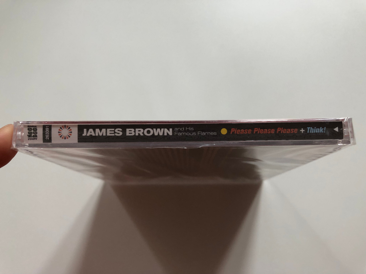 https://cdn10.bigcommerce.com/s-62bdpkt7pb/products/0/images/207120/James_Brown_And_His_Famous_Flames_Please_Please_Please_Plus_Think_2Lps_On_1CD_HooDoo_Records_Audio_CD_2011_263391_3__99855.1642186610.1280.1280.JPG?c=2&_gl=1*1liq60x*_ga*MjA2NTIxMjE2MC4xNTkwNTEyNTMy*_ga_WS2VZYPC6G*MTY0MjE3MzQyOC4yNjMuMS4xNjQyMTg2NDc1LjMy