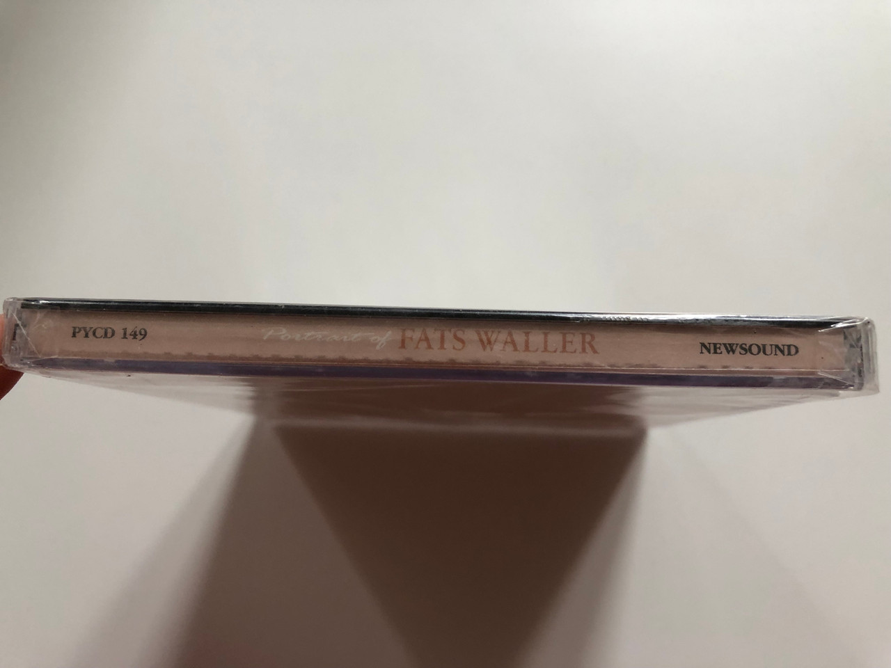 https://cdn10.bigcommerce.com/s-62bdpkt7pb/products/0/images/207727/Portrait_Of_Fats_Waller_Songs_Include_Old_Grand_Dad_Dry_Bones_Stop_Pretending_Fats_Waller_Original_E_Flat_Blues_Too_Tired_and_many_more_Penny_Audio_CD_1996_PYCD_149_3__47159.1642417659.1280.1280.JPG?c=2&_gl=1*1y5t5vc*_ga*MjA2NTIxMjE2MC4xNTkwNTEyNTMy*_ga_WS2VZYPC6G*MTY0MjQwMzU5OS4yNjQuMS4xNjQyNDE3MTAwLjM2