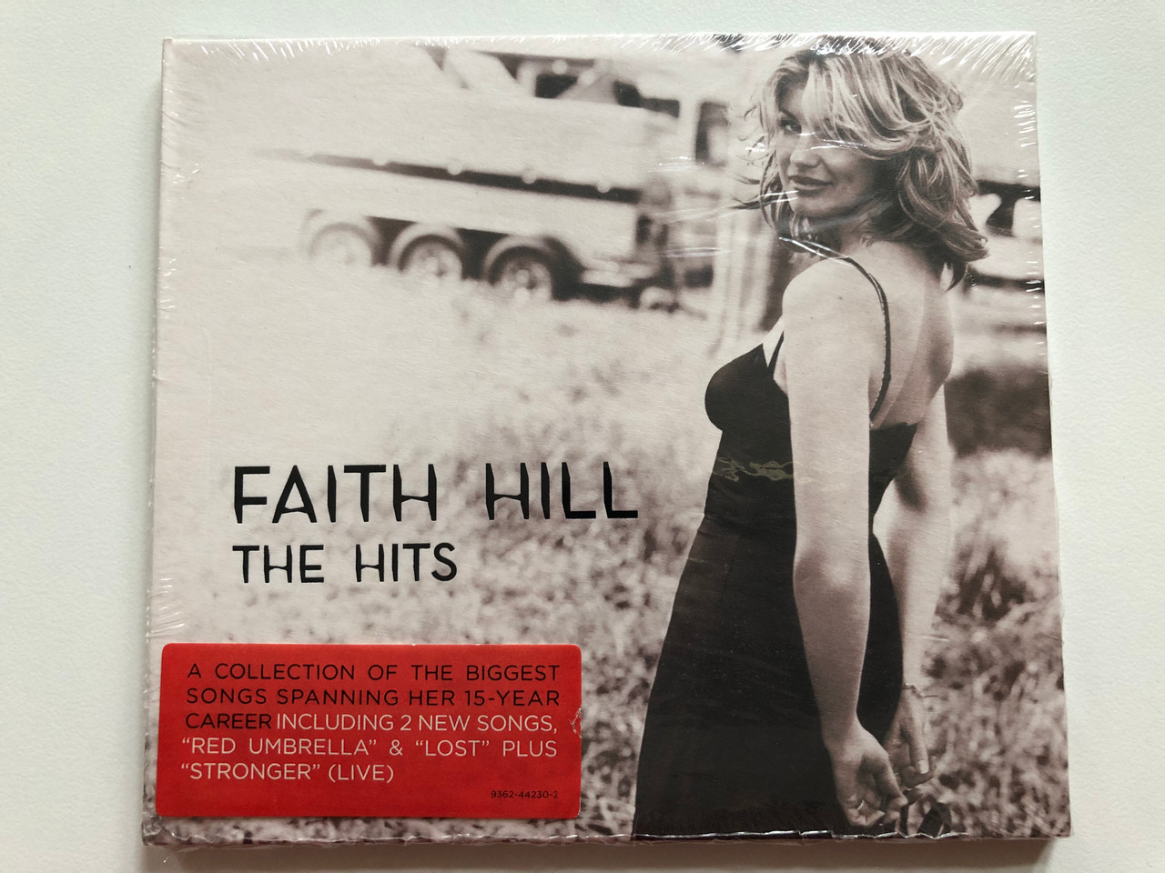 https://cdn10.bigcommerce.com/s-62bdpkt7pb/products/0/images/207859/Faith_Hill_The_Hits_A_Collection_Of_The_Biggest_Songs_Spanning_Her_15-Year_Career_Including_2_New_Songs_Red_Umbrella_Lost_Plus_Stronger_Live_Warner_Bros._Records_Audio_CD_1__16122.1642499330.1280.1280.JPG?c=2&_gl=1*1fboap2*_ga*MjA2NTIxMjE2MC4xNTkwNTEyNTMy*_ga_WS2VZYPC6G*MTY0MjQ4NzMxNy4yNjUuMS4xNjQyNDk5MTIyLjU3