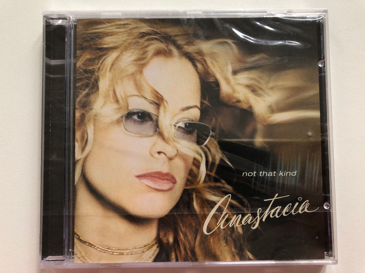 https://cdn10.bigcommerce.com/s-62bdpkt7pb/products/0/images/207922/Anastacia_Not_That_Kind_Epic_Audio_CD_2000_497412_2_1__06905.1642571529.1280.1280.JPG?c=2&_gl=1*116i7s4*_ga*MjA2NTIxMjE2MC4xNTkwNTEyNTMy*_ga_WS2VZYPC6G*MTY0MjU2ODQxNC4yNjYuMS4xNjQyNTcxNDE2LjQy