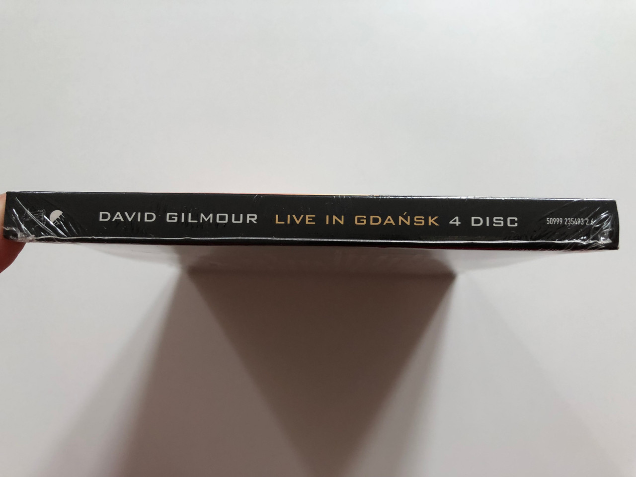 https://cdn10.bigcommerce.com/s-62bdpkt7pb/products/0/images/207969/David_Gilmour_Live_In_Gdask_4_Disc_Edition_Live_In_The_Gdask_Shipyard_With_The_Baltic_Philharmonic_Symphony_Orchestra_in_Gdask_EMI_2x_Audio_CD_2x_DVD_CD_2008_50999_235493_2_6_3__47496.1642580128.1280.1280.JPG?c=2&_gl=1*1w4i3ks*_ga*MjA2NTIxMjE2MC4xNTkwNTEyNTMy*_ga_WS2VZYPC6G*MTY0MjU2ODQxNC4yNjYuMS4xNjQyNTgwMTM0LjYw