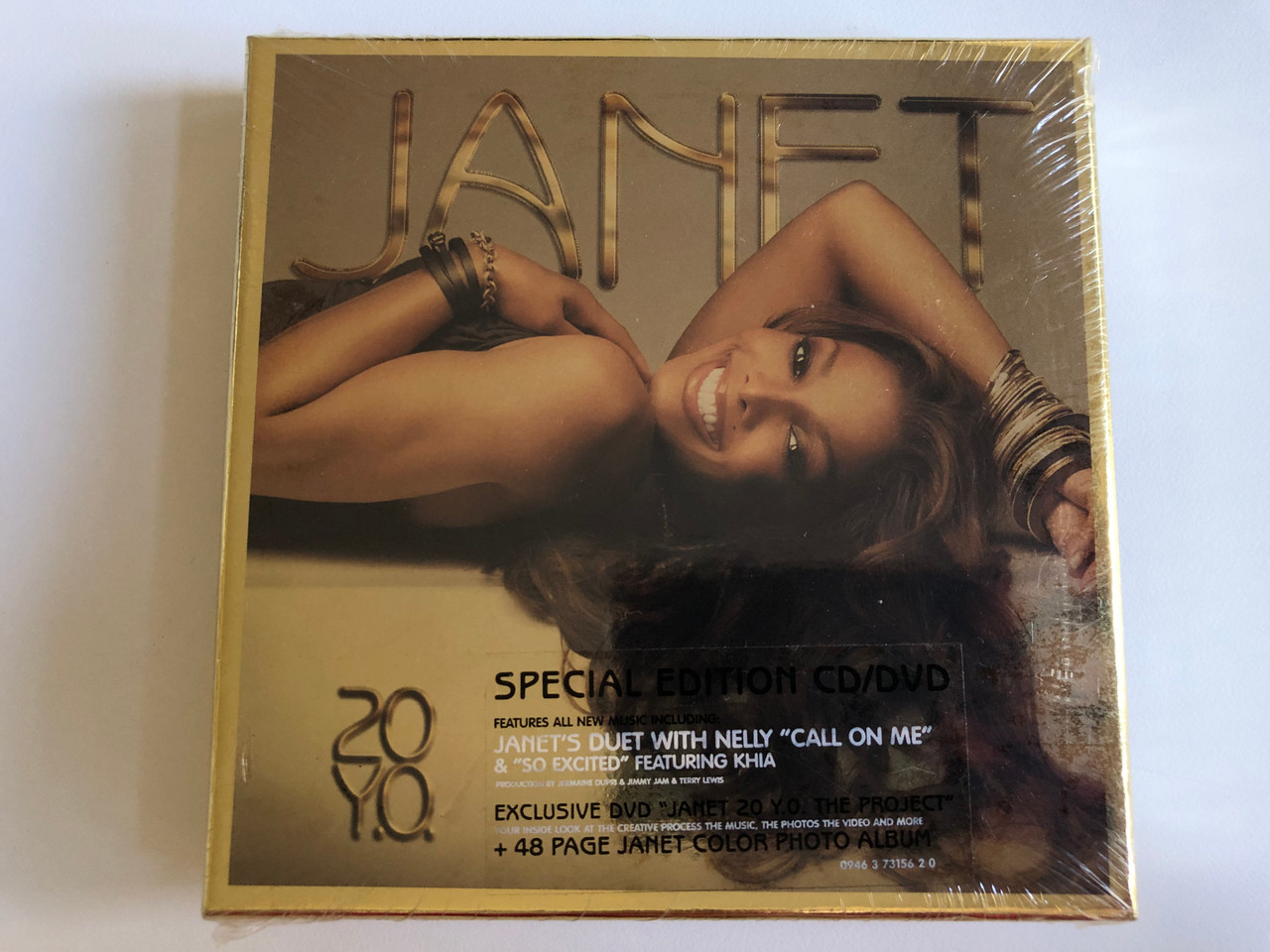 https://cdn10.bigcommerce.com/s-62bdpkt7pb/products/0/images/208098/Janet_20_Y.O._Special_Edition_CDDVD_Features_All_New_Music_Including_Janets_Duet_With_Nelly_Call_On_Me_So_Excited_Featuring_Khia_Production_By_Jermaine_Dupri_Jimmy_Jam_Ter_1__15798.1642659191.1280.1280.JPG?c=2&_gl=1*u7730w*_ga*MjA2NTIxMjE2MC4xNTkwNTEyNTMy*_ga_WS2VZYPC6G*MTY0MjY1NTc3MC4yNjcuMS4xNjQyNjU4ODg2LjUw