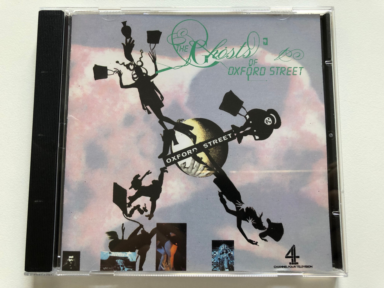 https://cdn10.bigcommerce.com/s-62bdpkt7pb/products/0/images/208167/The_Ghosts_Of_Oxford_Street_RCA_Audio_CD_1991_Stereo_PD_75233_1__14703.1642664270.1280.1280.JPG?c=2&_gl=1*c3m5ug*_ga*MjA2NTIxMjE2MC4xNTkwNTEyNTMy*_ga_WS2VZYPC6G*MTY0MjY1NTc3MC4yNjcuMS4xNjQyNjY0MTI0LjQ3