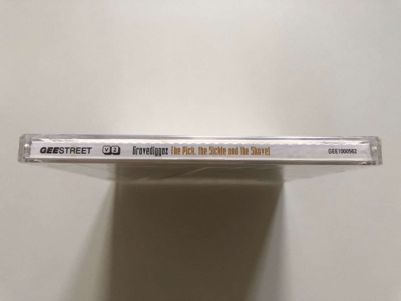 https://cdn10.bigcommerce.com/s-62bdpkt7pb/products/0/images/208190/Gravediggaz_The_Pick_The_Sickle_And_The_Shovel_Gee_Street_Audio_CD_1997_GEE1000562_3__58116.1642678864.1280.1280.JPG?c=2&_gl=1*21x9nb*_ga*MjA2NTIxMjE2MC4xNTkwNTEyNTMy*_ga_WS2VZYPC6G*MTY0MjY3NjgyNy4yNjguMS4xNjQyNjc4NzY1LjQx