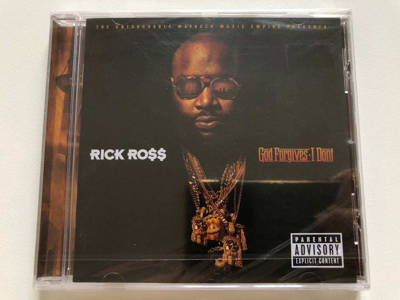 https://cdn10.bigcommerce.com/s-62bdpkt7pb/products/0/images/208194/Rick_Ross_God_Forgives_I_Dont_Maybach_Music_Group_Audio_CD_2012_602527889221_1__47949.1642679104.1280.1280.JPG?c=2&_gl=1*kyi1ih*_ga*MjA2NTIxMjE2MC4xNTkwNTEyNTMy*_ga_WS2VZYPC6G*MTY0MjY3NjgyNy4yNjguMS4xNjQyNjc5MDAyLjQw