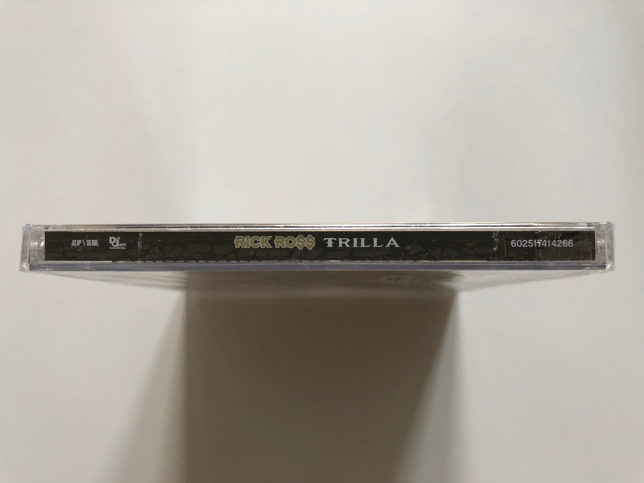 https://cdn10.bigcommerce.com/s-62bdpkt7pb/products/0/images/208196/Rick_Ro_Trilla_Slip-N-Slide_Records_Audio_CD_2008_602517414266_3__12444.1642679758.1280.1280.JPG?c=2&_gl=1*16d7tsw*_ga*MjA2NTIxMjE2MC4xNTkwNTEyNTMy*_ga_WS2VZYPC6G*MTY0MjY3NjgyNy4yNjguMS4xNjQyNjc5NTQ3LjU3