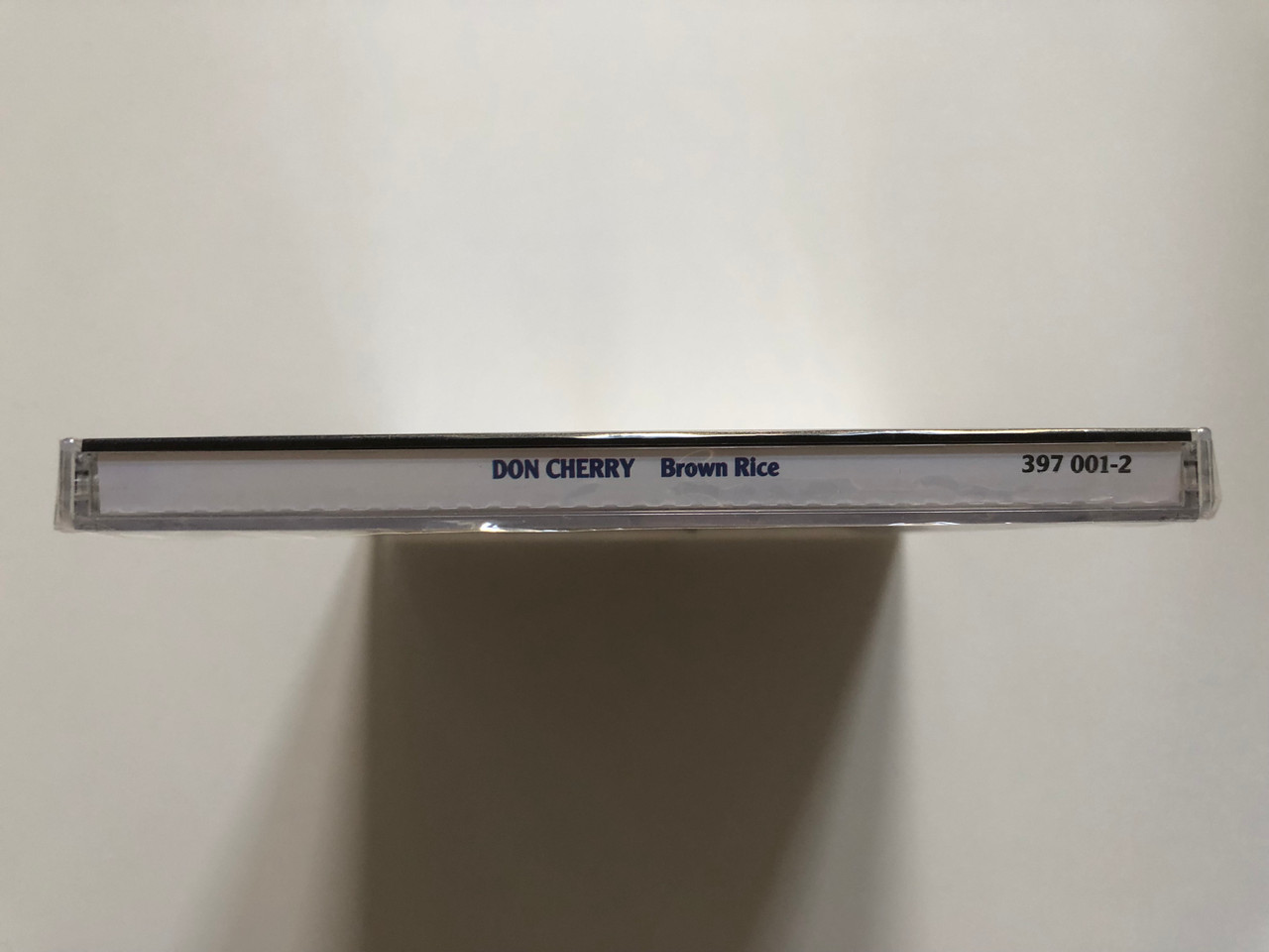 https://cdn10.bigcommerce.com/s-62bdpkt7pb/products/0/images/208208/Don_Cherry_Brown_Rice_Jazz_Heritage_AM_Records_Audio_CD_1989_397_001-2_3__50750.1642681201.1280.1280.JPG?c=2&_gl=1*1yyt1hx*_ga*MjA2NTIxMjE2MC4xNTkwNTEyNTMy*_ga_WS2VZYPC6G*MTY0MjY3NjgyNy4yNjguMS4xNjQyNjgxMTA4LjQz