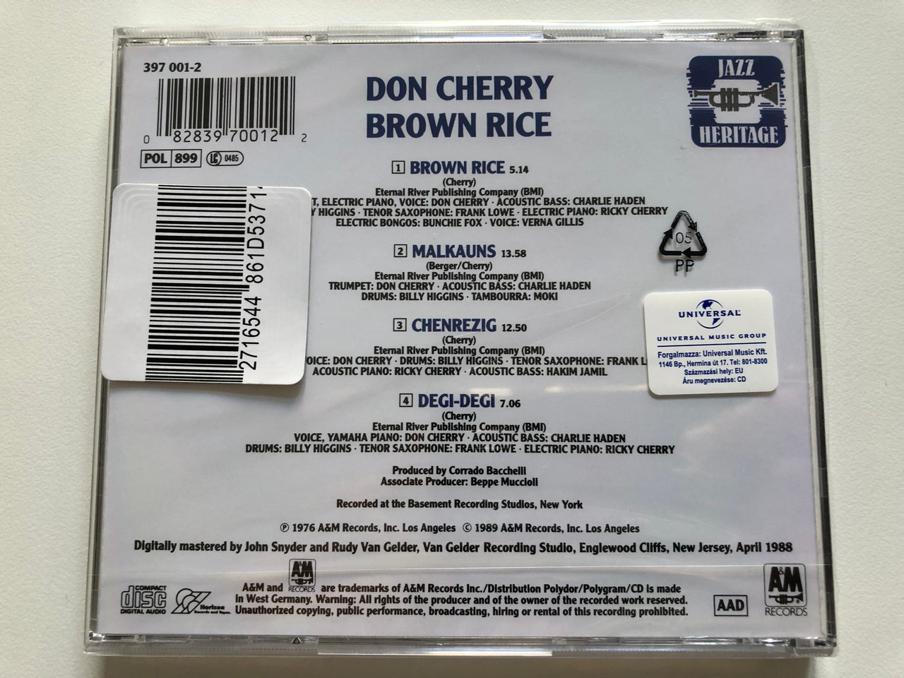 https://cdn10.bigcommerce.com/s-62bdpkt7pb/products/0/images/208210/Don_Cherry_Brown_Rice_Jazz_Heritage_AM_Records_Audio_CD_1989_397_001-2_2__97848.1642681202.1280.1280.JPG?c=2&_gl=1*1yyt1hx*_ga*MjA2NTIxMjE2MC4xNTkwNTEyNTMy*_ga_WS2VZYPC6G*MTY0MjY3NjgyNy4yNjguMS4xNjQyNjgxMTA4LjQz