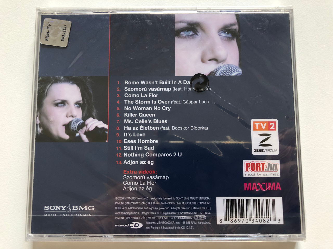 https://cdn10.bigcommerce.com/s-62bdpkt7pb/products/0/images/208254/Pka_Angla_Dalok_A_Dntbl_Rajta_Szomoru_Vasarnap_2_Video_Sony_BMG_Music_Entertainment_Audio_CD_2006_88697034082_2__90370.1642751503.1280.1280.JPG?c=2&_gl=1*1159h1g*_ga*MjA2NTIxMjE2MC4xNTkwNTEyNTMy*_ga_WS2VZYPC6G*MTY0Mjc0ODQwMy4yNjkuMS4xNjQyNzUxMzI3LjQx