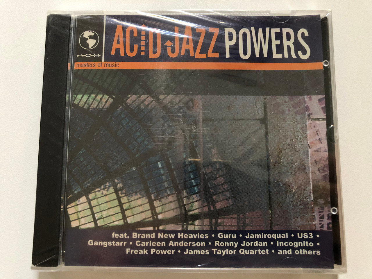 https://cdn10.bigcommerce.com/s-62bdpkt7pb/products/0/images/208277/Acid_Jazz_Powers_Masters_Of_Music_Audio_CD_MOM_214_1__60078.1642755251.1280.1280.JPG?c=2&_gl=1*w7qq84*_ga*MjA2NTIxMjE2MC4xNTkwNTEyNTMy*_ga_WS2VZYPC6G*MTY0Mjc0ODQwMy4yNjkuMS4xNjQyNzU1MjQ0LjYw