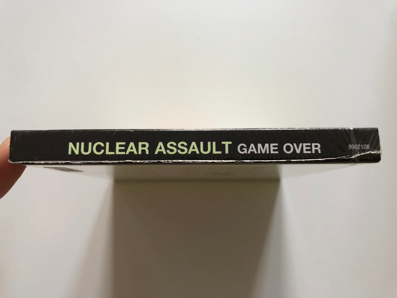https://cdn10.bigcommerce.com/s-62bdpkt7pb/products/0/images/208285/Nuclear_Assault_Game_Over_Radioactive_III_The_classic_debut_album_of_NYCs_thrash_metal_plague_mongers._Century_Media_Audio_CD_2008_9962108_3__03164.1642760552.1280.1280.JPG?c=2&_gl=1*14x484*_ga*MjA2NTIxMjE2MC4xNTkwNTEyNTMy*_ga_WS2VZYPC6G*MTY0Mjc1OTk0My4yNzAuMS4xNjQyNzYwMjQzLjM1