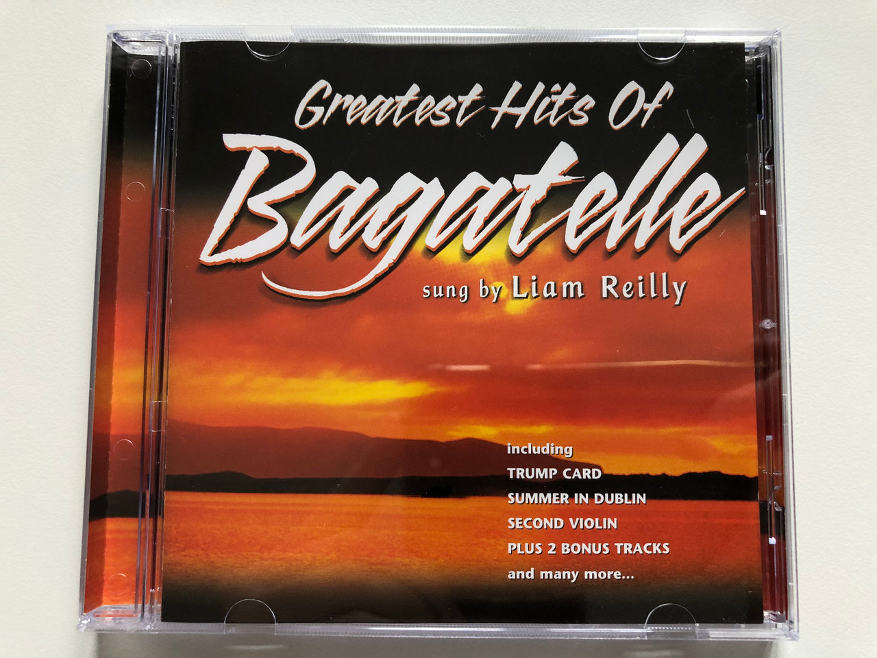 https://cdn10.bigcommerce.com/s-62bdpkt7pb/products/0/images/208636/Greatest_Hits_Of_Bagatelle_Sung_By_Liam_Reilly_Including_Trump_Card_Summer_In_Dublin_Second_Violin_Plus_2_Bonus_Tracks_and_many_more..._Emerald_Audio_CD_EMCD_9005_1__15847.1643048426.1280.1280.JPG?c=2&_gl=1*3ihyth*_ga*MjA2NTIxMjE2MC4xNTkwNTEyNTMy*_ga_WS2VZYPC6G*MTY0MzAzMjA3MC4yNzEuMS4xNjQzMDQ3OTg3LjU2