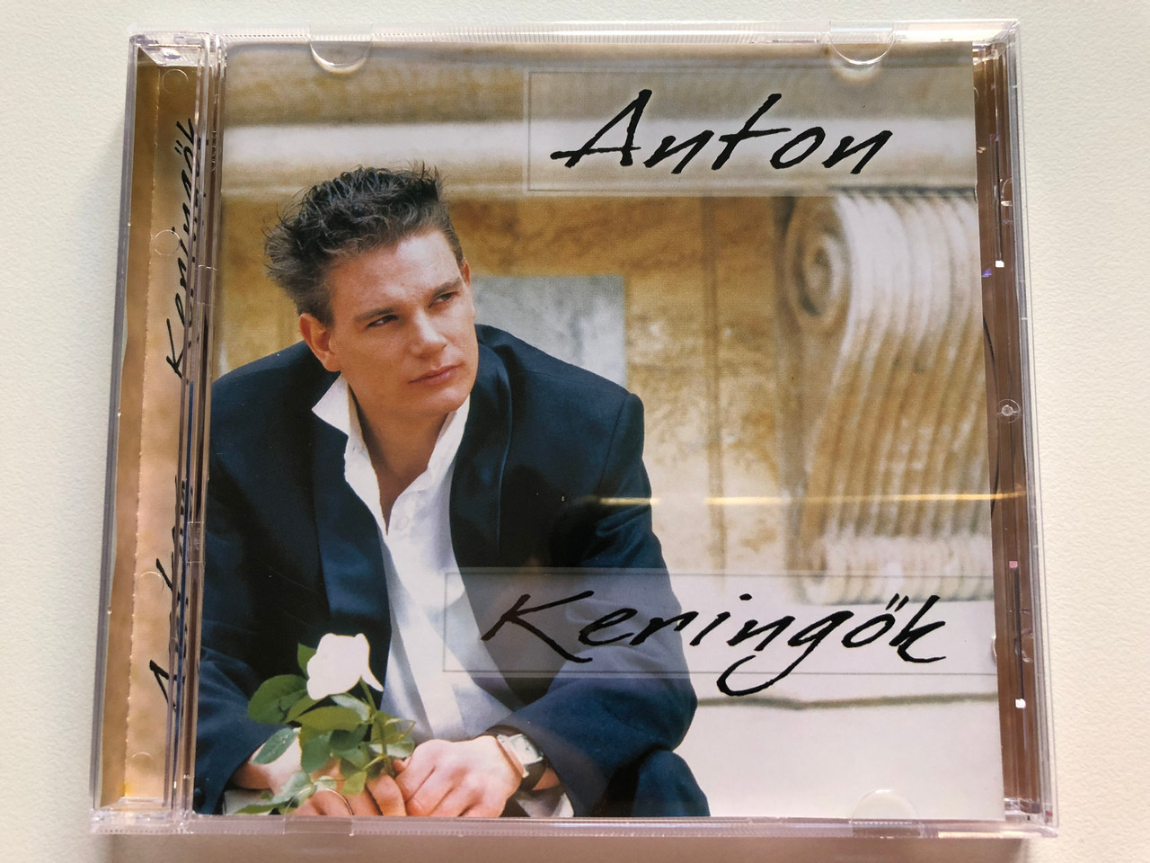 https://cdn10.bigcommerce.com/s-62bdpkt7pb/products/0/images/208925/Anton_-_Keringok_Universal_Music_Audio_CD_2005_982_878-2_1__11453.1643128306.1280.1280.JPG?c=2&_gl=1*esgqke*_ga*MjA2NTIxMjE2MC4xNTkwNTEyNTMy*_ga_WS2VZYPC6G*MTY0MzEyNTY1Mi4yNzIuMS4xNjQzMTI4MjAyLjYw
