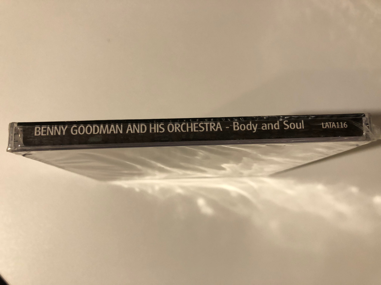 https://cdn10.bigcommerce.com/s-62bdpkt7pb/products/0/images/209221/Benny_Goodman_and_His_Orchestra_Body_And_Soul_Weton-Wesgram_Audio_CD_2005_LATA116_3__83052.1643216736.1280.1280.JPG?c=2&_gl=1*1udylee*_ga*MjA2NTIxMjE2MC4xNTkwNTEyNTMy*_ga_WS2VZYPC6G*MTY0MzIwOTQ0MC4yNzMuMS4xNjQzMjE2NjE5LjQ0