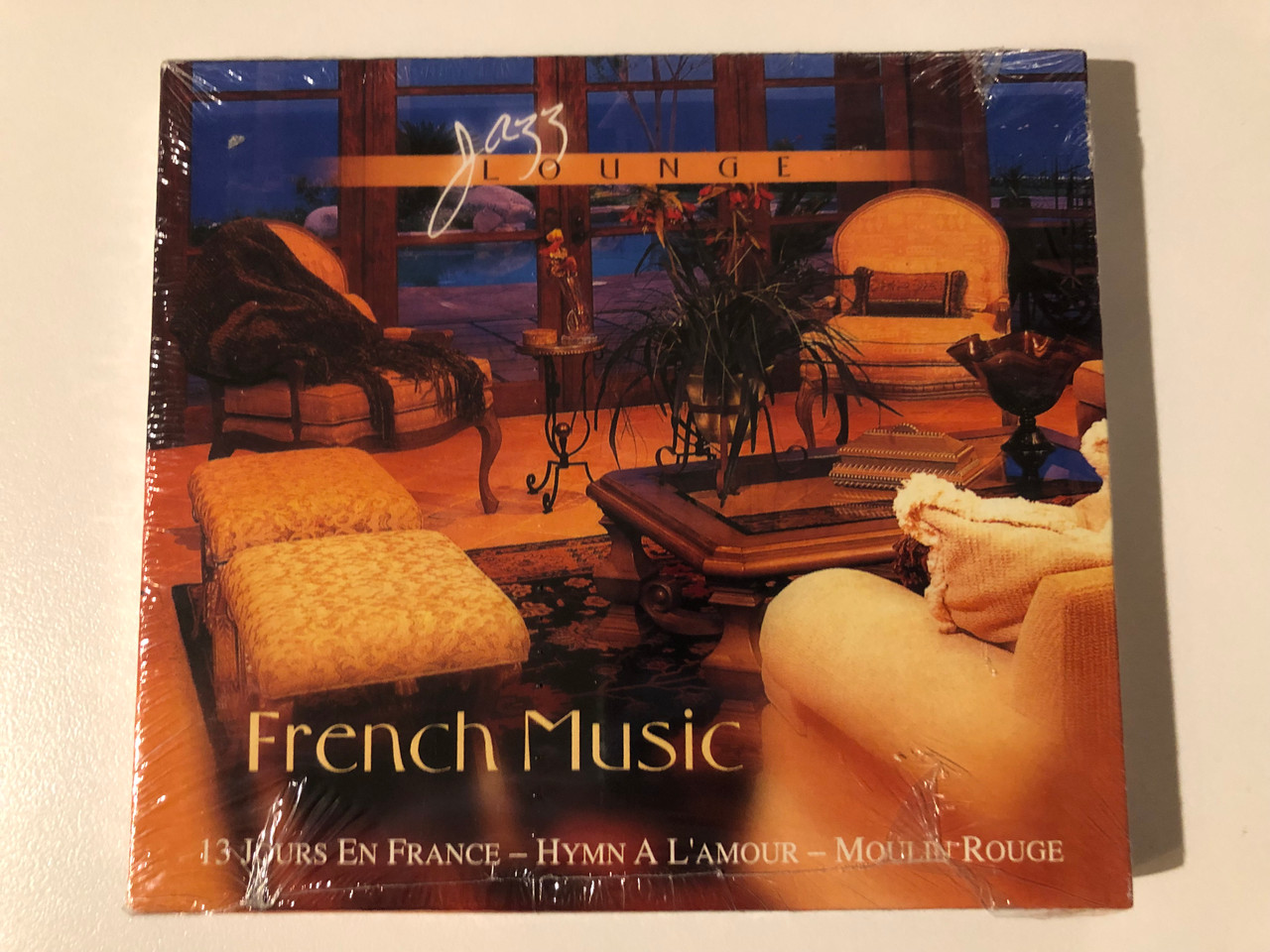 https://cdn10.bigcommerce.com/s-62bdpkt7pb/products/0/images/209241/Jazz_Lounge_-_French_Music_13_Jours_En_France_-_Hymn_A_LAmour_-_Moulin-Rouge_Eurotrend_Audio_CD_2005_CD_142_1__67157.1643218056.1280.1280.JPG?c=2&_gl=1*ddawyn*_ga*MjA2NTIxMjE2MC4xNTkwNTEyNTMy*_ga_WS2VZYPC6G*MTY0MzIwOTQ0MC4yNzMuMS4xNjQzMjE3ODk3LjYw