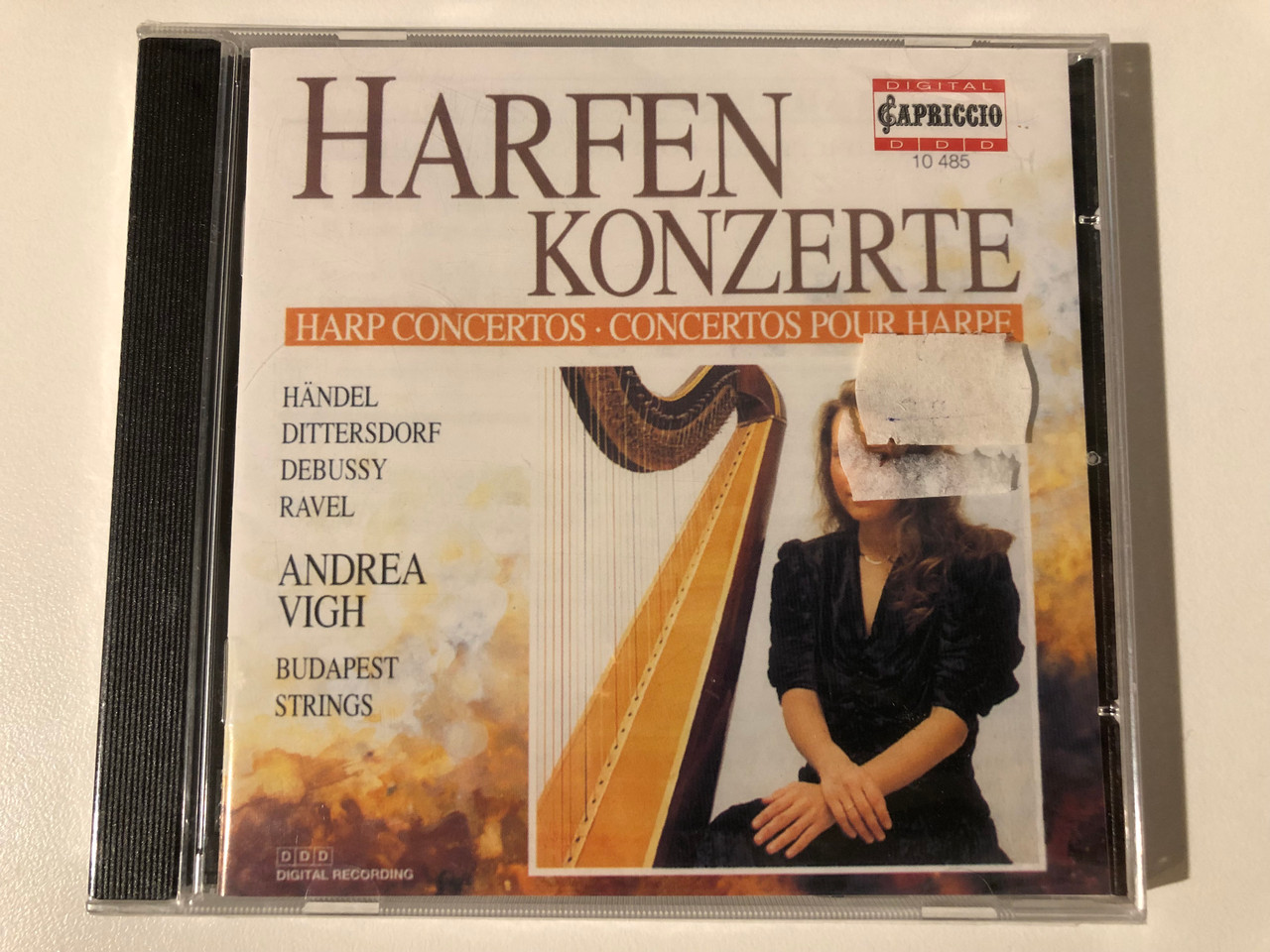 https://cdn10.bigcommerce.com/s-62bdpkt7pb/products/0/images/209320/Harfenkonzerte_Harp_Concertos_Concertos_Pour_Harpe_-_Handel_Dittersdorf_Debussy_Ravel_-_Vgh_Andrea_Budapest_Strings_Capriccio_Audio_CD_1993_Stereo_10_485_1__96396.1643291646.1280.1280.JPG?c=2&_gl=1*19o24hx*_ga*MjA2NTIxMjE2MC4xNTkwNTEyNTMy*_ga_WS2VZYPC6G*MTY0MzI4OTkwNy4yNzQuMS4xNjQzMjkxMzU4LjM5