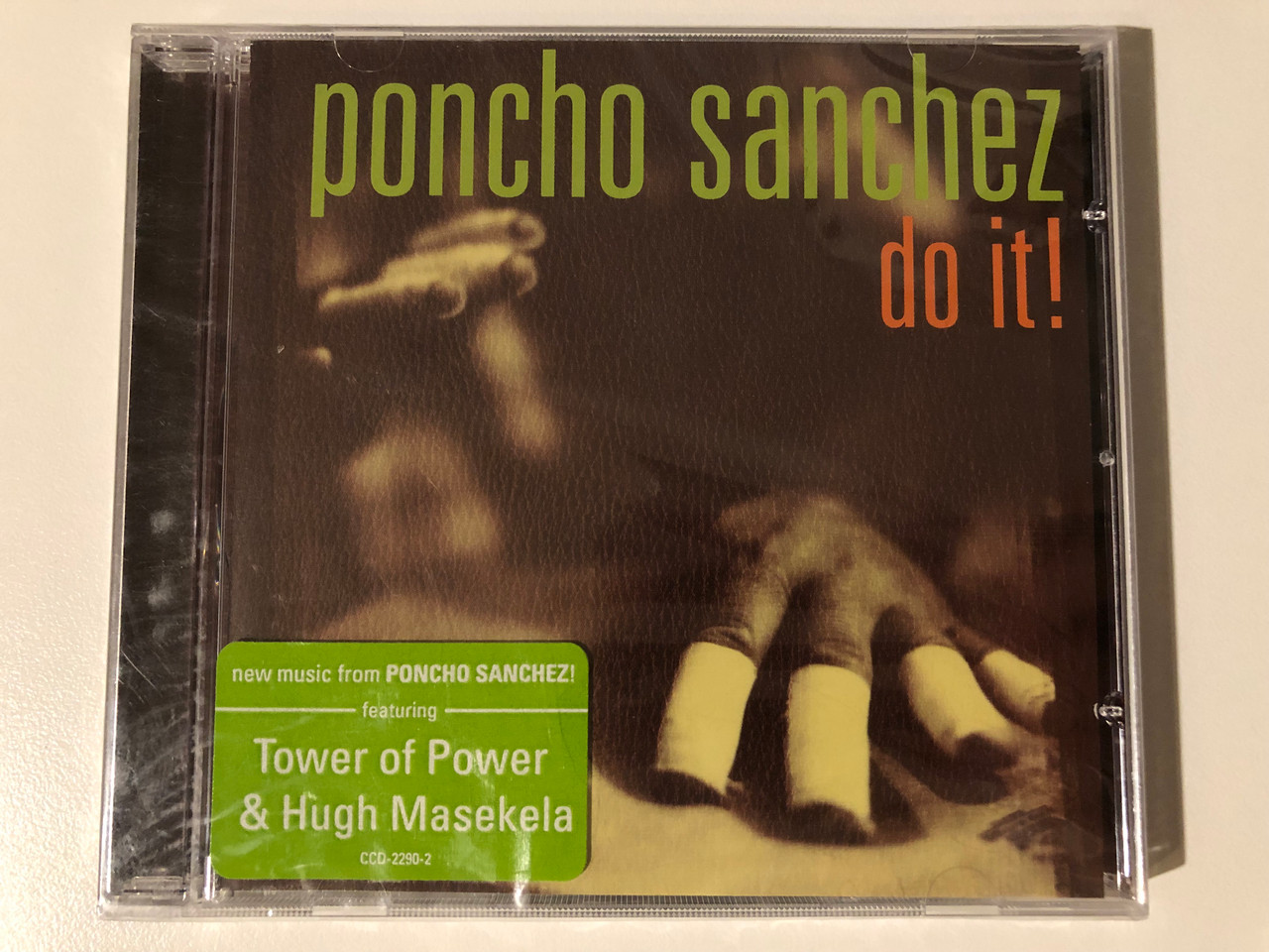 https://cdn10.bigcommerce.com/s-62bdpkt7pb/products/0/images/209379/Poncho_Sanchez_Do_It_New_music_from_Poncho_Sanchez_featuring_Tower_Of_Power_Hugh_Masekela_Concord_Picante_Audio_CD_2005_CCD-2290-2_1__62311.1643298056.1280.1280.JPG?c=2&_gl=1*t63t5a*_ga*MjA2NTIxMjE2MC4xNTkwNTEyNTMy*_ga_WS2VZYPC6G*MTY0MzI5NTg5Ni4yNzUuMS4xNjQzMjk4MDI4LjYw
