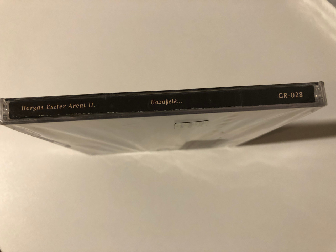https://cdn10.bigcommerce.com/s-62bdpkt7pb/products/0/images/209389/Horgas_Eszter_Nagy_Janos_-_Hazatele..._Horgas_Eszter_Arcai_II_Gramy_Records_Audio_CD_2001_GR-028_3__93924.1643299157.1280.1280.JPG?c=2&_gl=1*1r8fv35*_ga*MjA2NTIxMjE2MC4xNTkwNTEyNTMy*_ga_WS2VZYPC6G*MTY0MzI5NTg5Ni4yNzUuMS4xNjQzMjk5MDI4LjM2